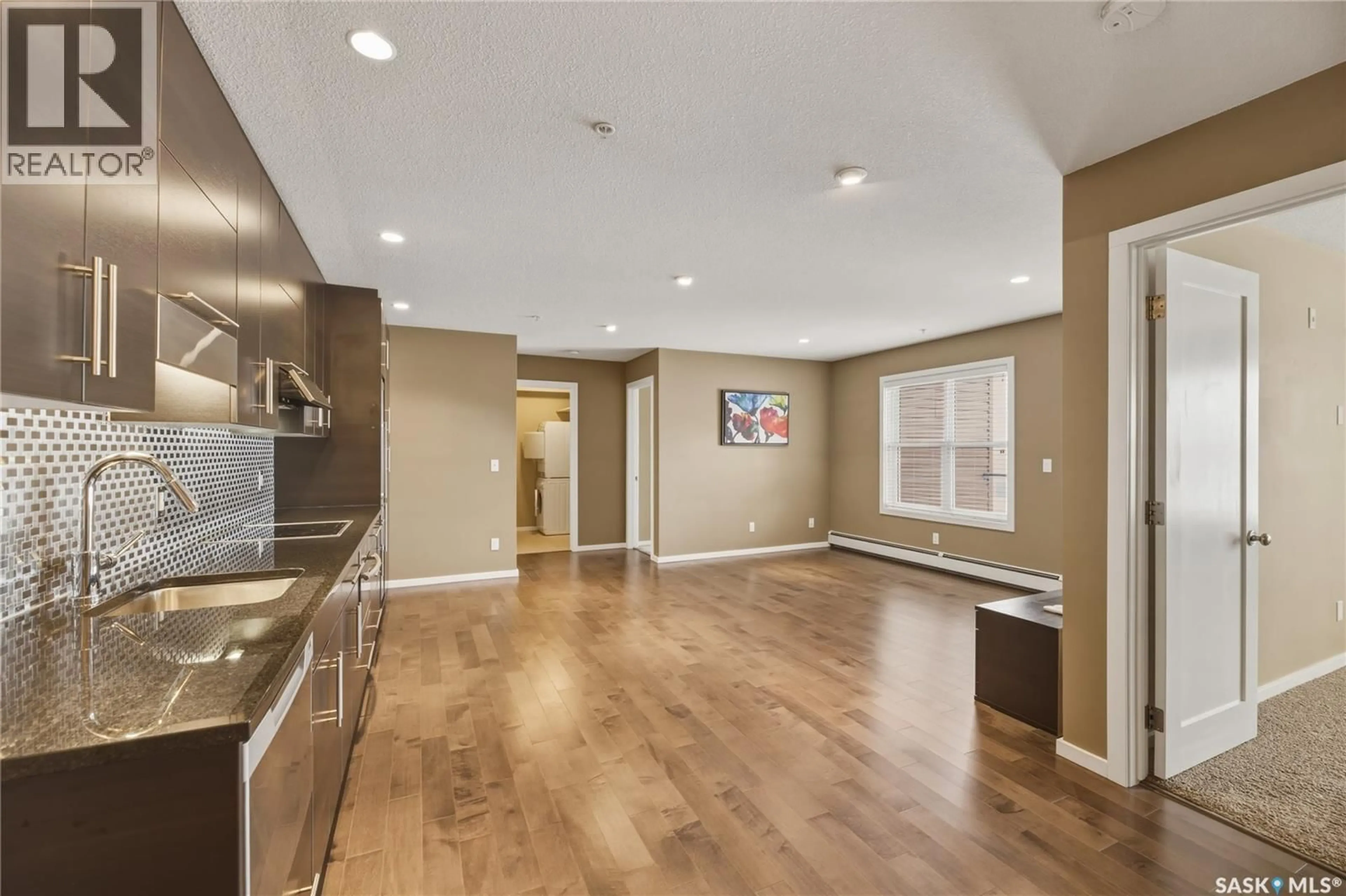 Open concept kitchen, unknown for 204 - 230 SLIMMON ROAD, Saskatoon Saskatchewan S7V0B3