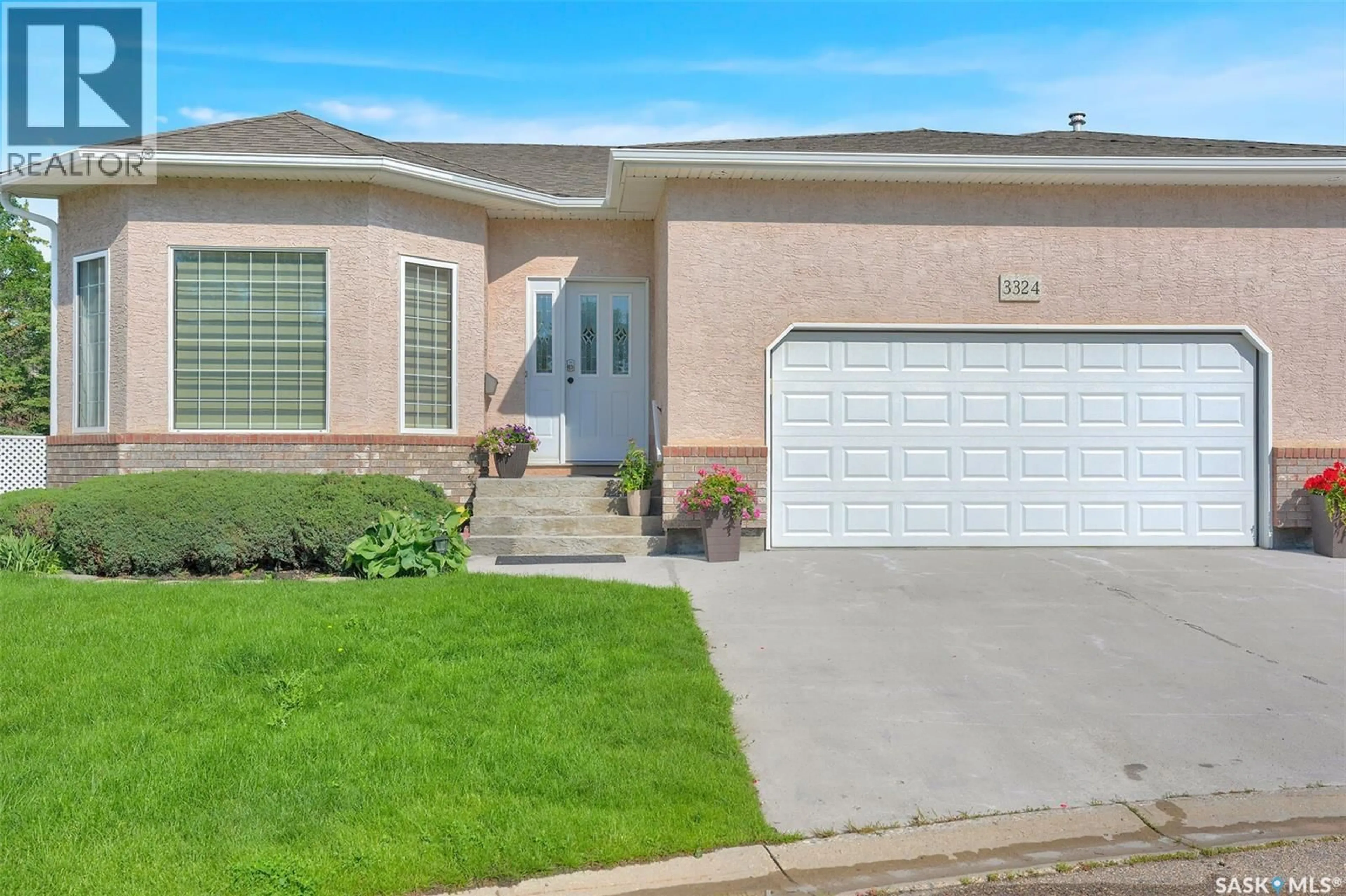 Home with vinyl exterior material, street for 3324 BUCKINGHAM DRIVE, Regina Saskatchewan S4V2S8