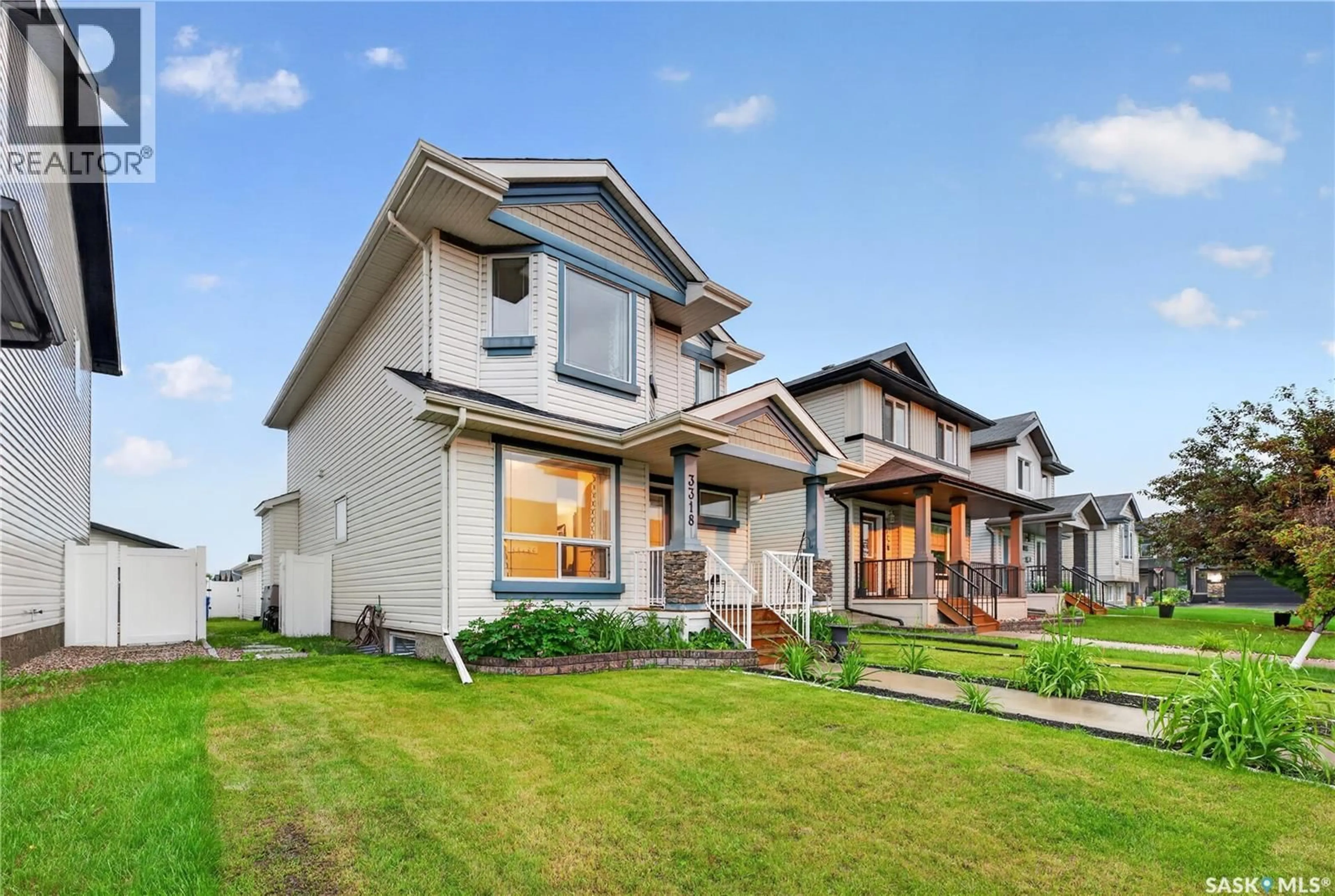 Home with brick exterior material, street for 3318 GREEN MOSS LANE, Regina Saskatchewan S4V1P2