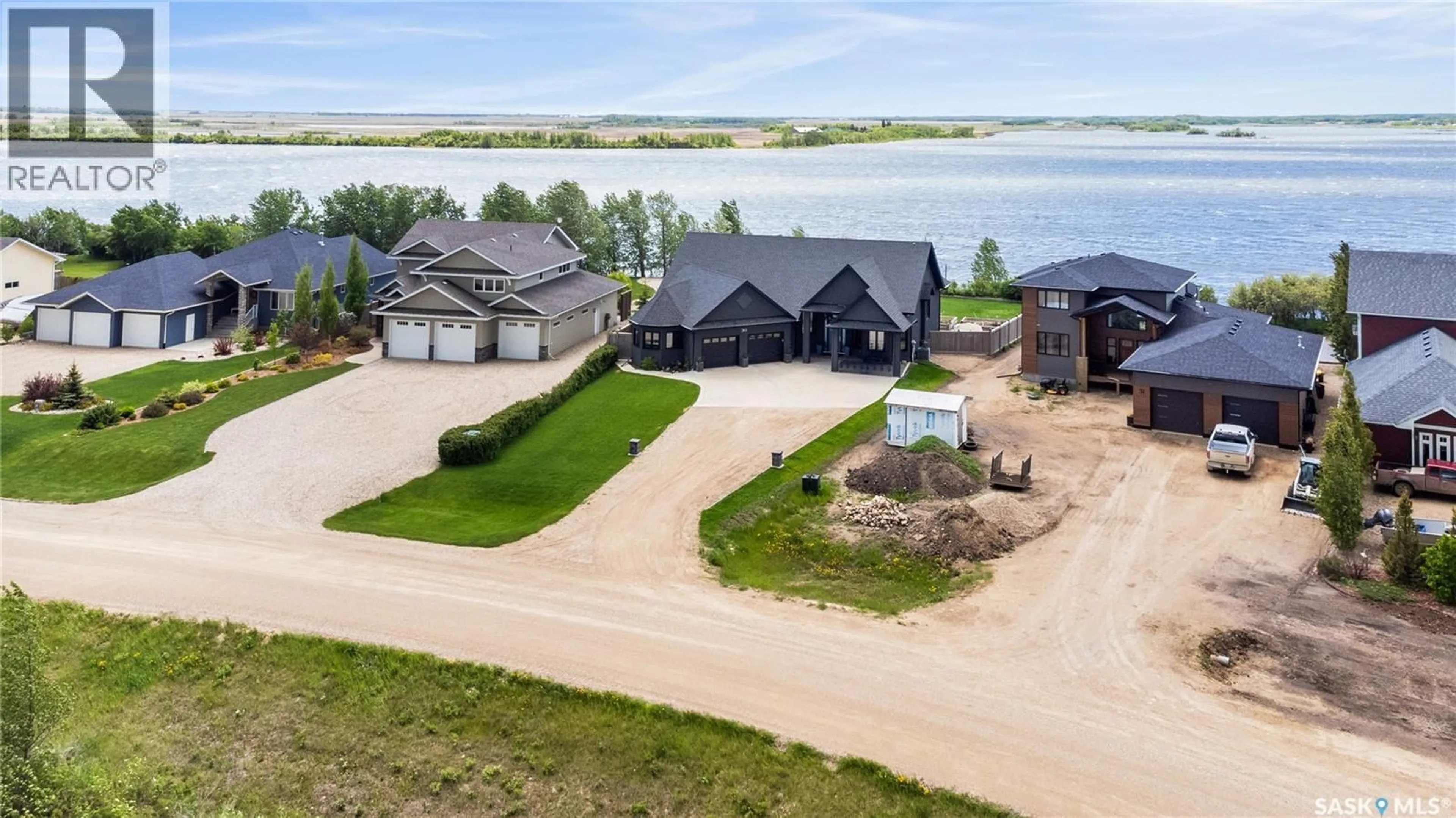 A pic from outside/outdoor area/front of a property/back of a property/a pic from drone, water/lake/river/ocean view for 30 PAPE DRIVE, Humboldt Lake Saskatchewan S0K2A0