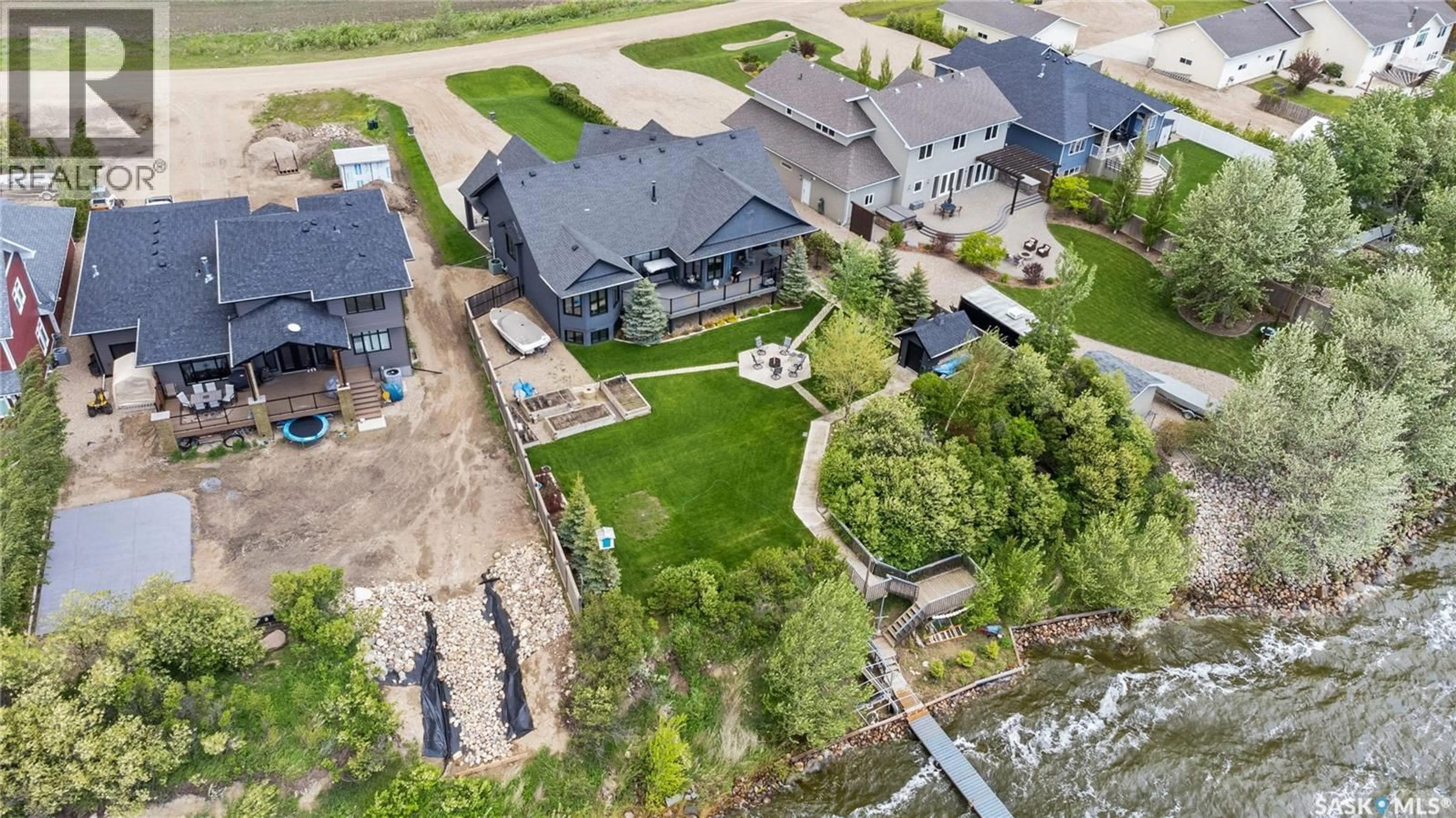 A pic from outside/outdoor area/front of a property/back of a property/a pic from drone, street for 30 PAPE DRIVE, Humboldt Lake Saskatchewan S0K2A0