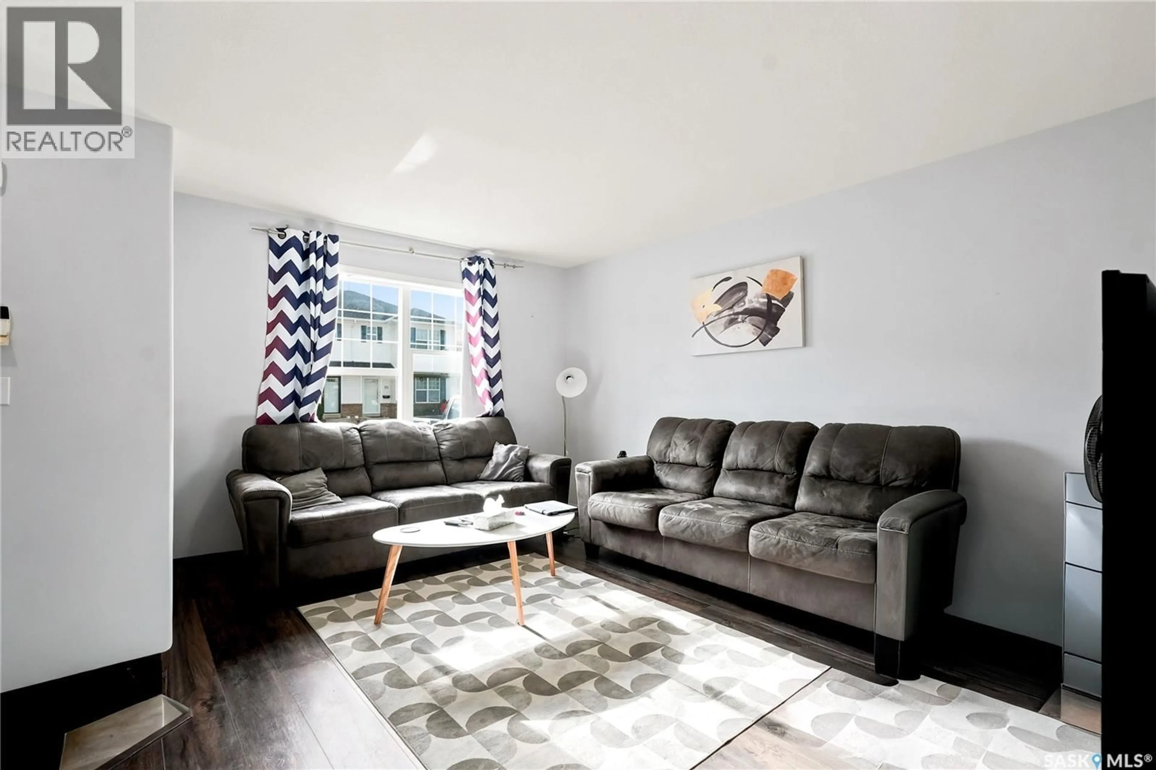 Living room with furniture, unknown for 8 203 HEROLD TERRACE, Saskatoon Saskatchewan S7V1H4
