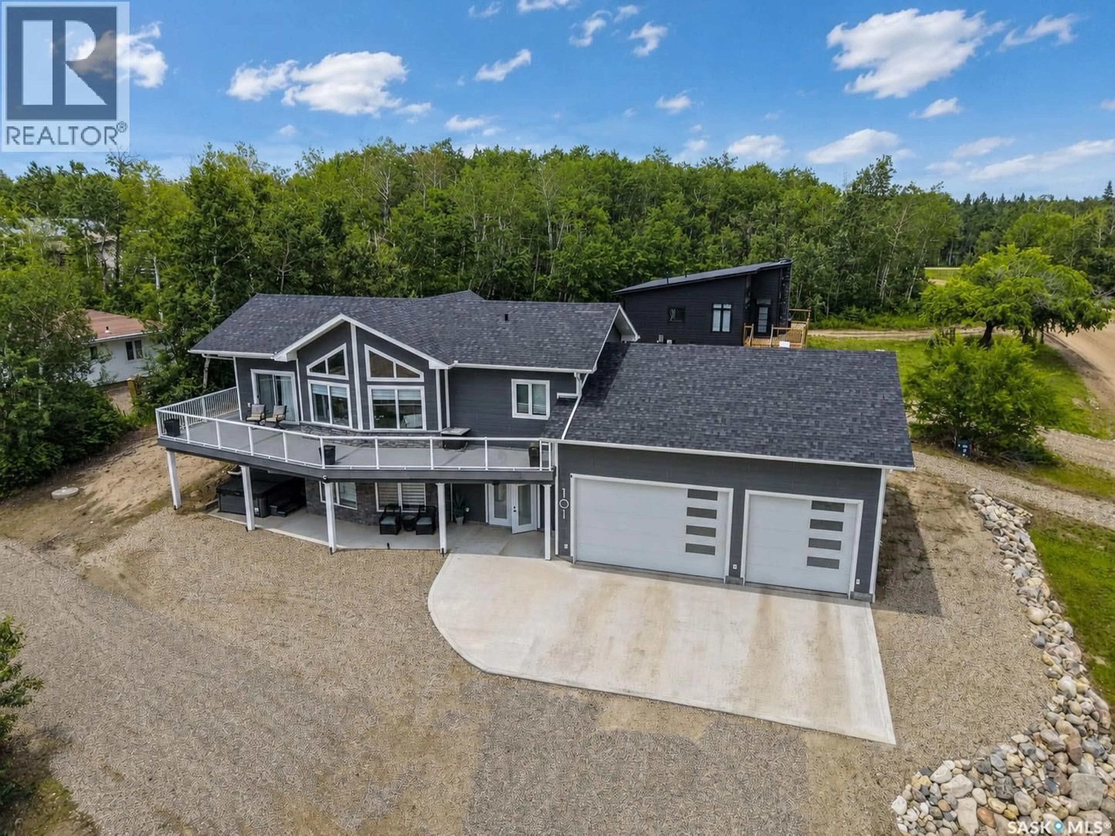 A pic from outside/outdoor area/front of a property/back of a property/a pic from drone, unknown for 101 JACOBSON DRIVE, Christopher Lake Saskatchewan S0J0N0