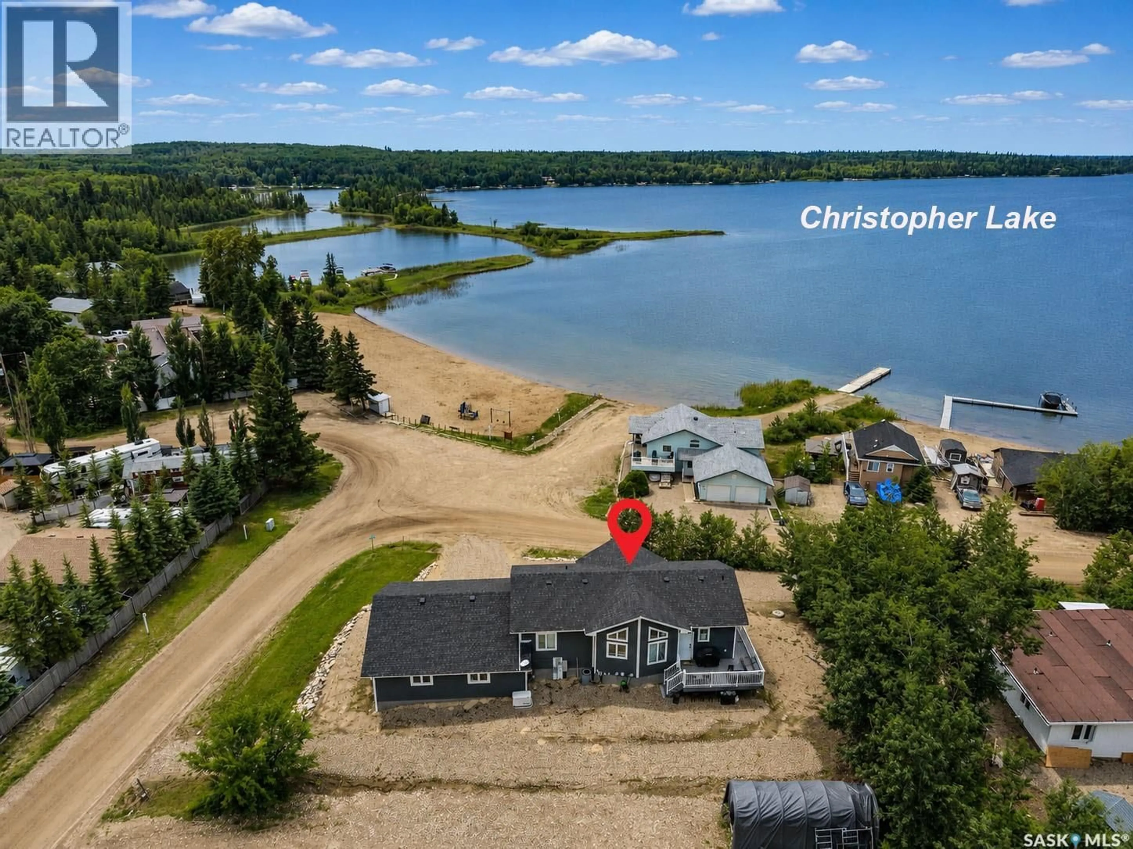 A pic from outside/outdoor area/front of a property/back of a property/a pic from drone, water/lake/river/ocean view for 101 JACOBSON DRIVE, Christopher Lake Saskatchewan S0J0N0