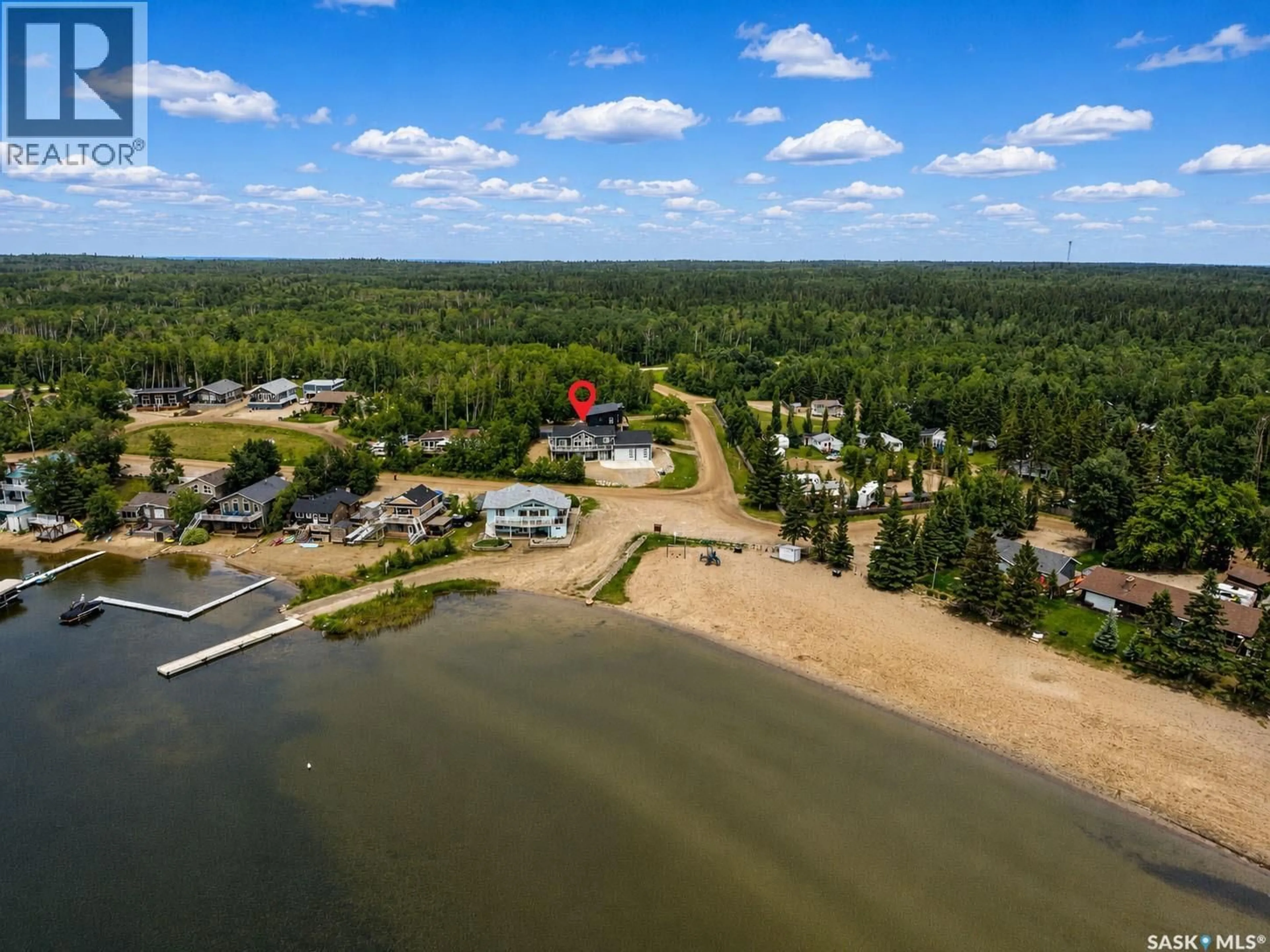 A pic from outside/outdoor area/front of a property/back of a property/a pic from drone, water/lake/river/ocean view for 101 JACOBSON DRIVE, Christopher Lake Saskatchewan S0J0N0