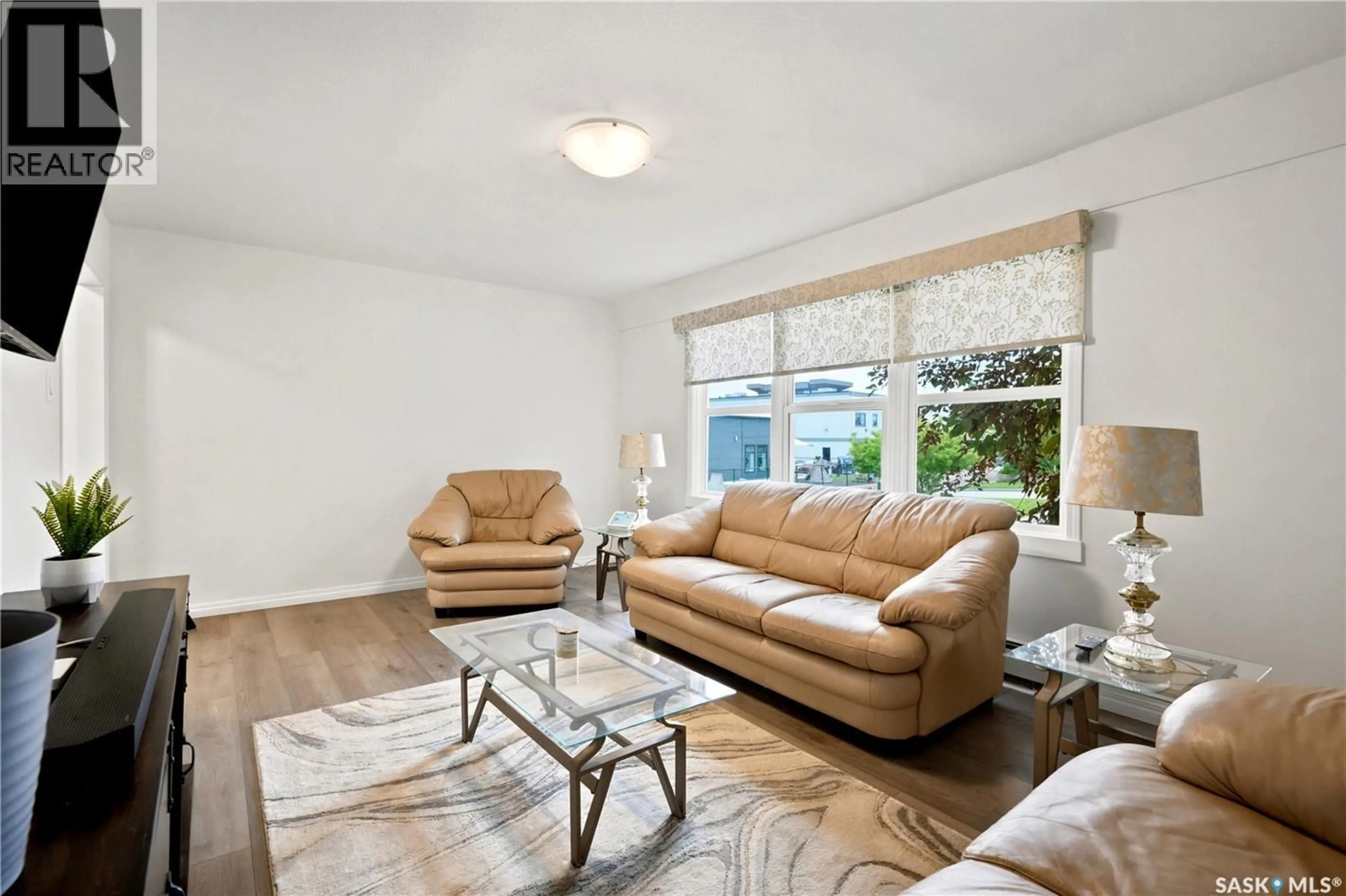 Living room with furniture, unknown for 36 210 CAMPONI PLACE, Saskatoon Saskatchewan S7M1J7