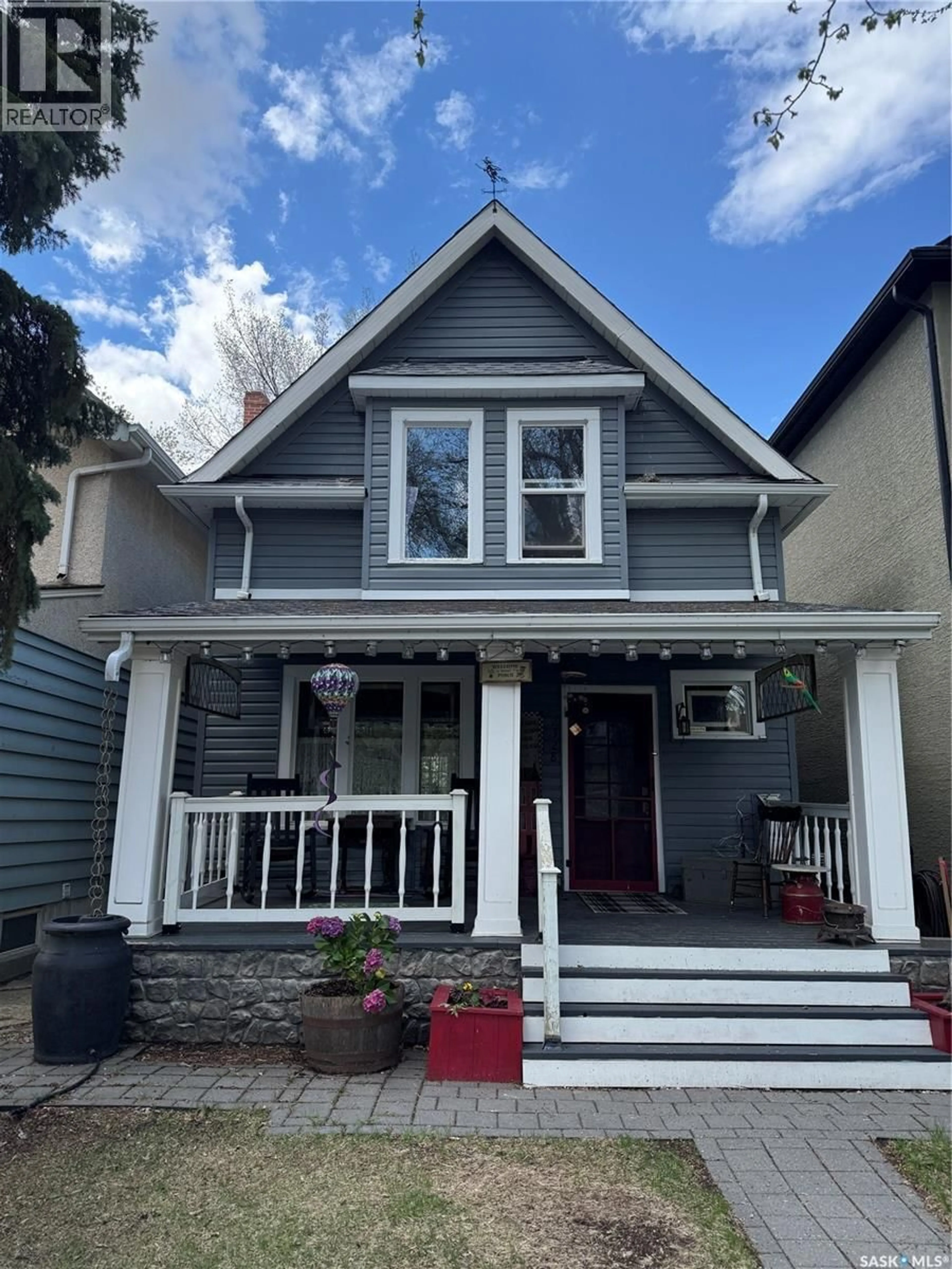 Home with vinyl exterior material, street for 2328 RAE STREET, Regina Saskatchewan S4T2G2