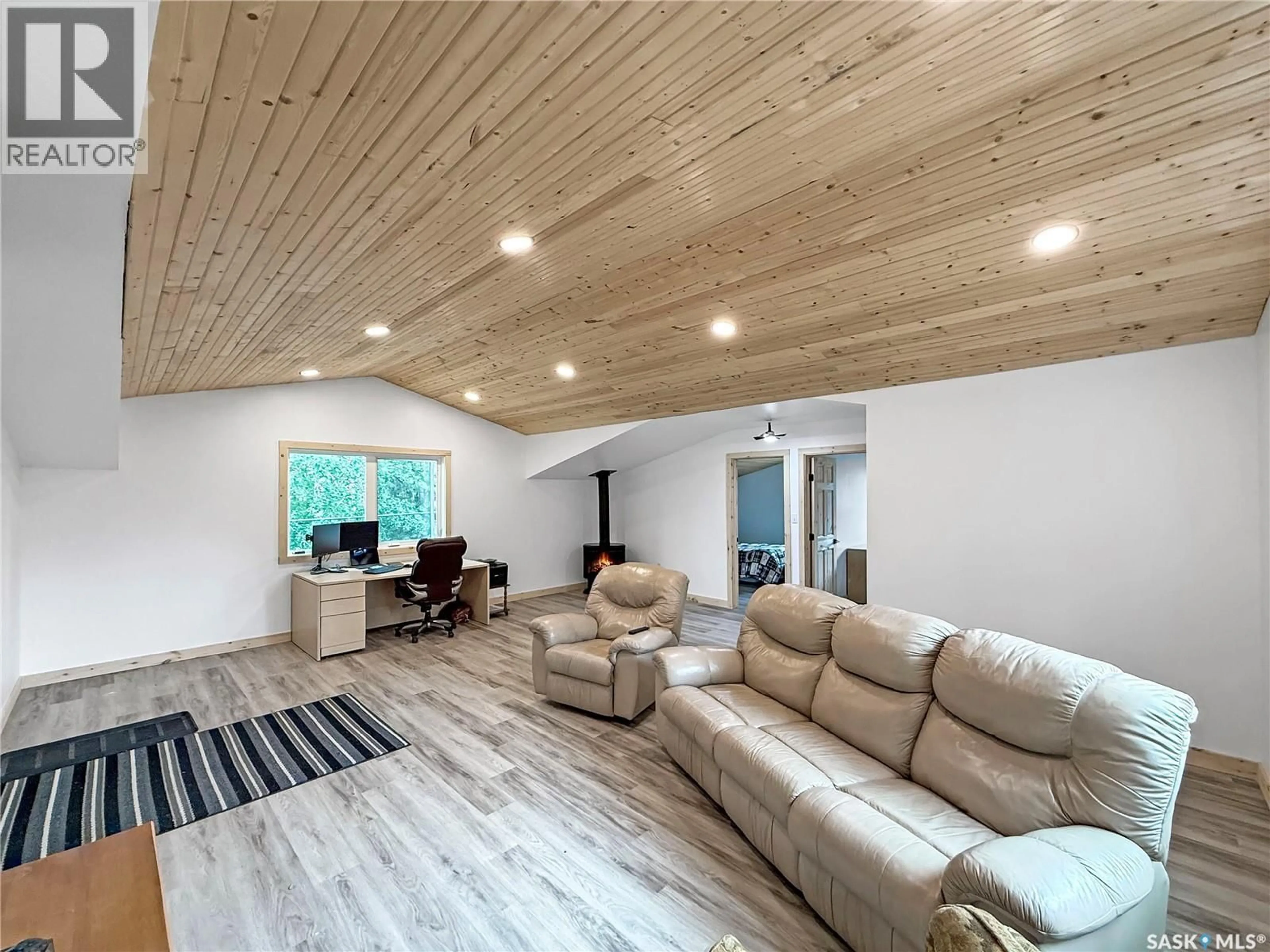 Living room with furniture, wood/laminate floor for 3 WHITE SPRUCE CRESCENT, Candle Lake Saskatchewan S0J3E0