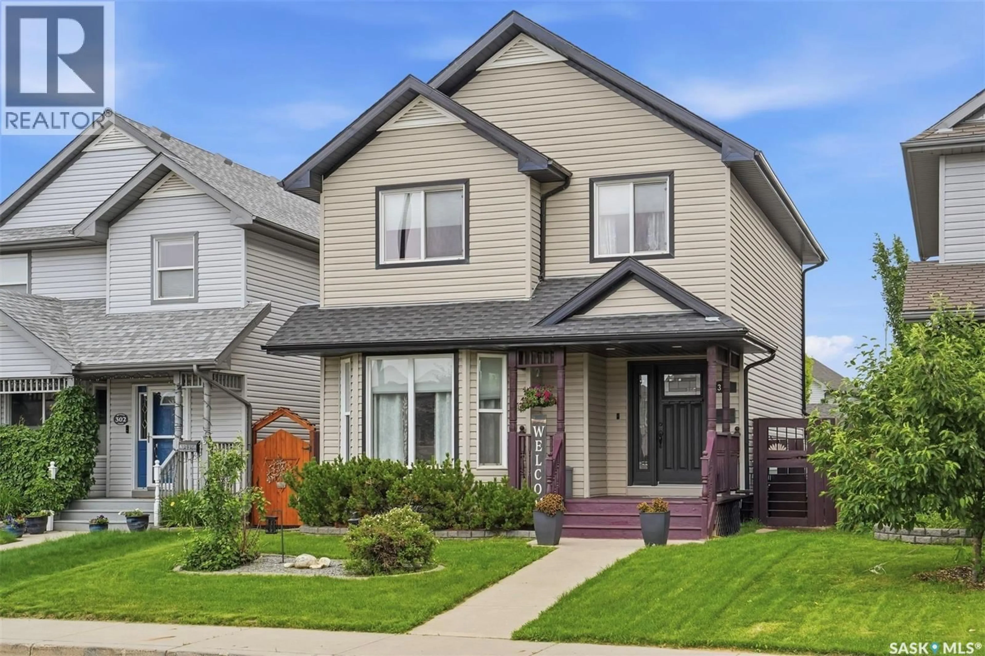 Home with vinyl exterior material, street for 306 DENHAM COURT, Saskatoon Saskatchewan S7K1E5