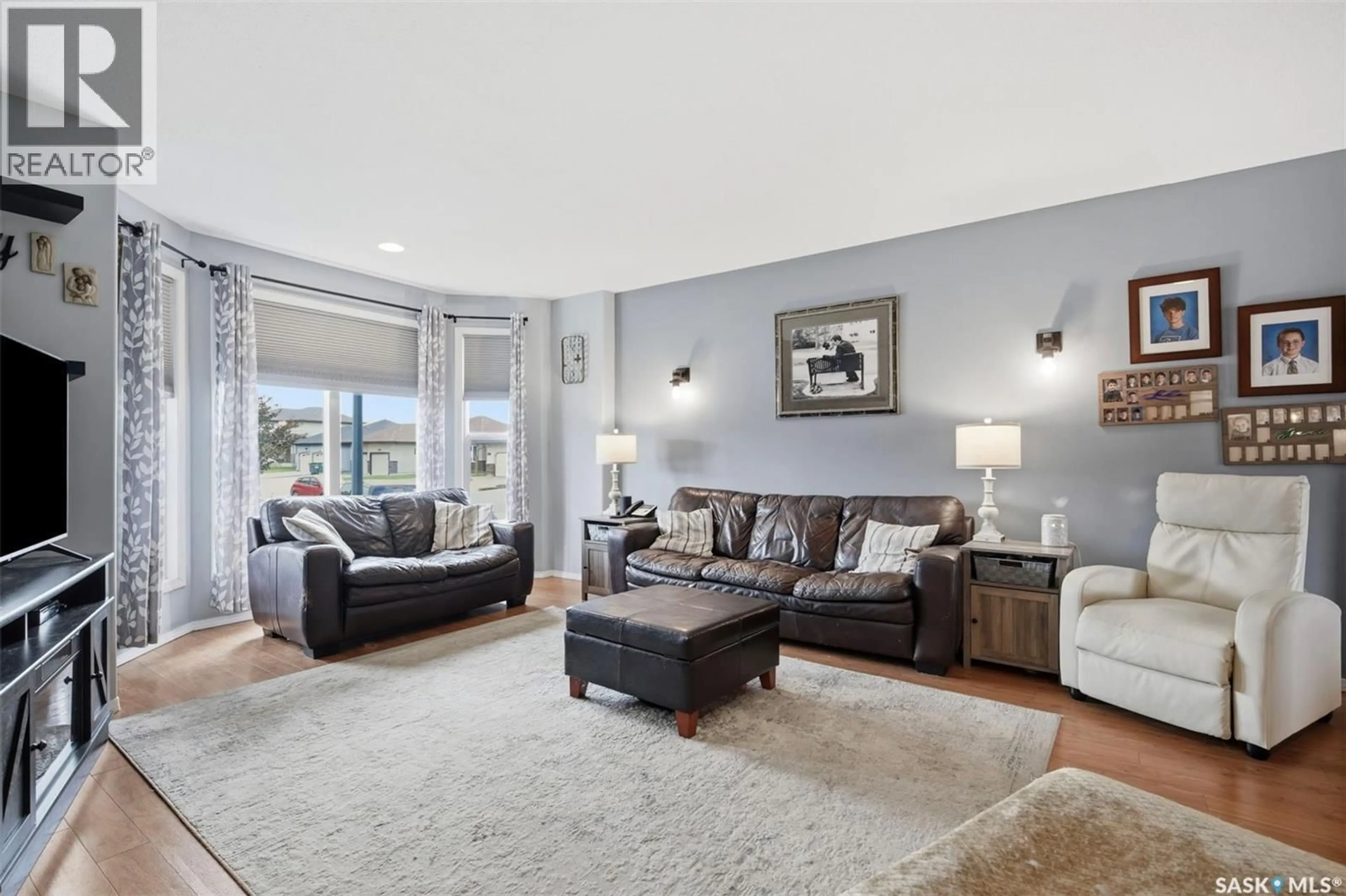 Living room with furniture, unknown for 306 DENHAM COURT, Saskatoon Saskatchewan S7K1E5