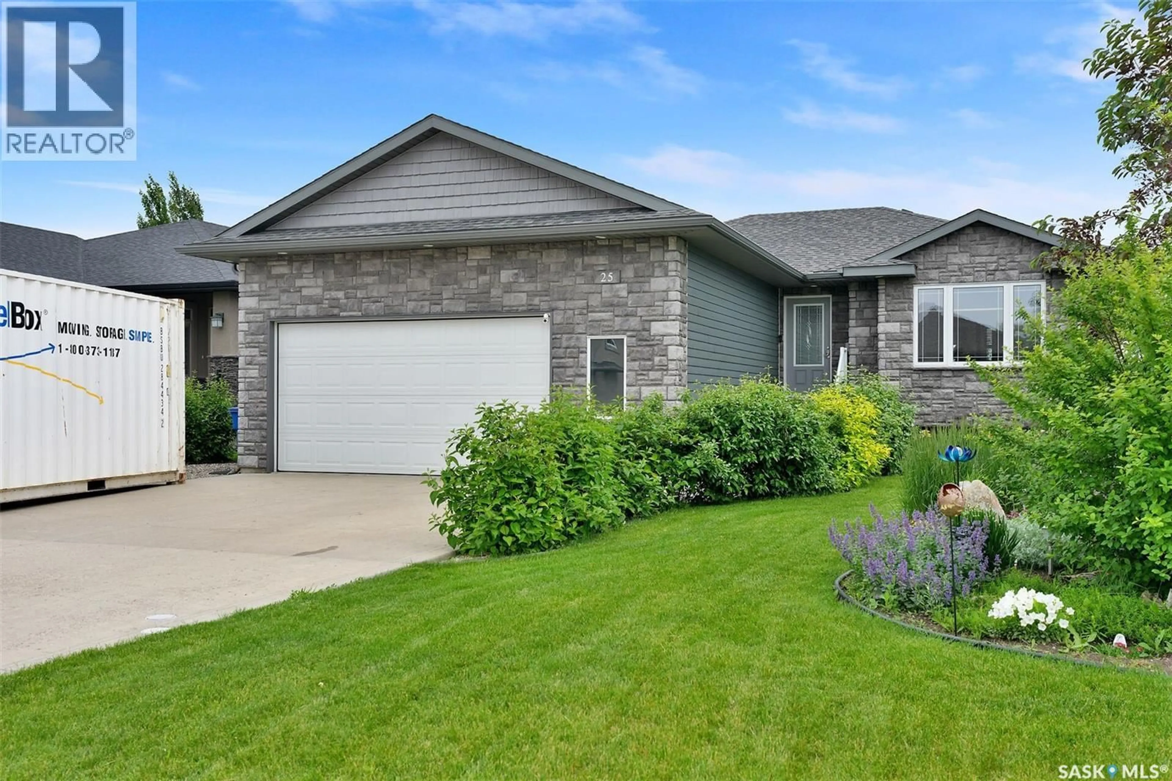 Home with vinyl exterior material, street for 25 EMERALD HILL DRIVE, White City Saskatchewan S4L0B4