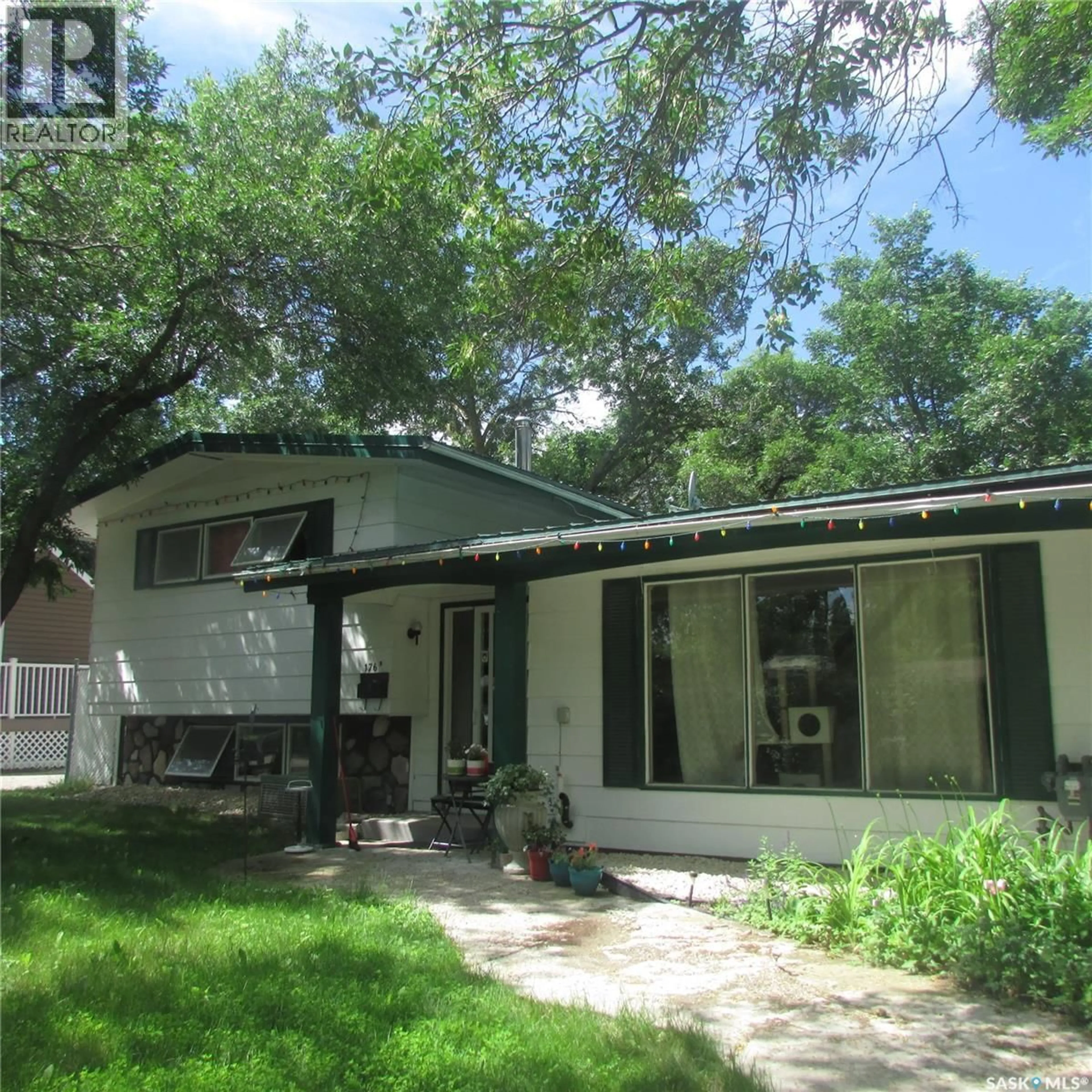 Home with vinyl exterior material, street for 176 HALIFAX STREET, Regina Saskatchewan S4R2W4