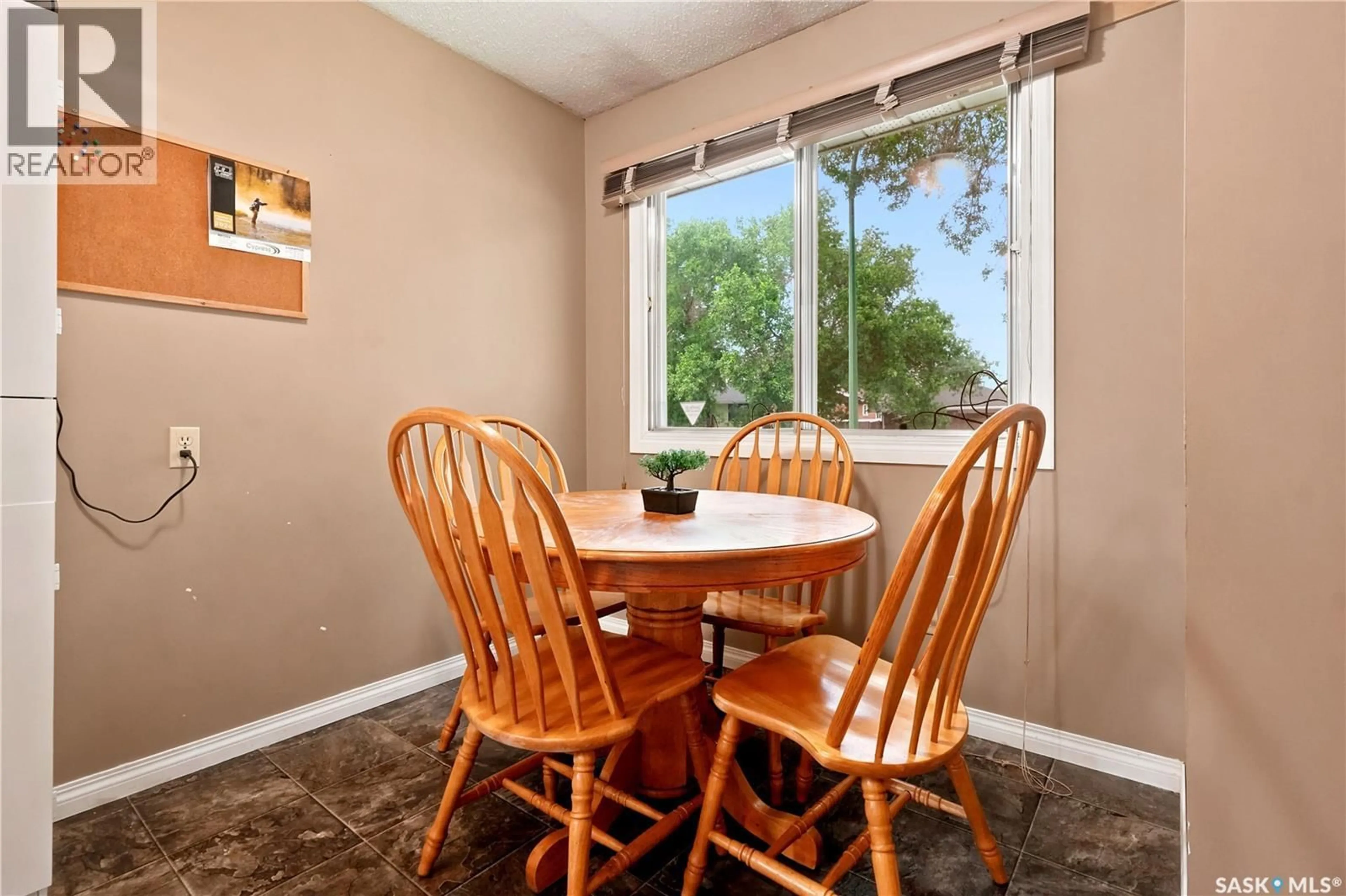 Dining room, wood/laminate floor for 109 CHURCH DRIVE, Regina Saskatchewan S4X1L7