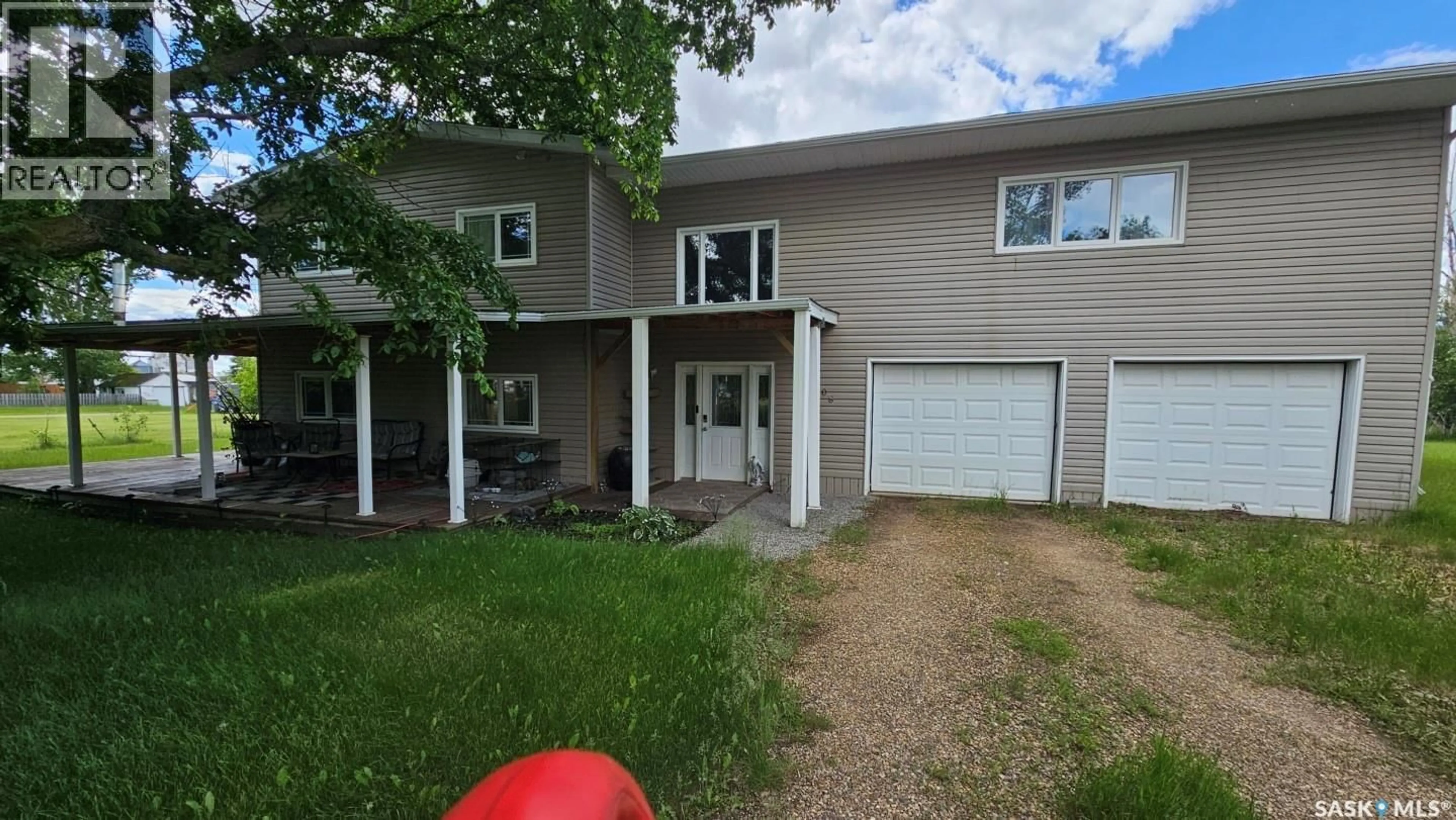 Home with vinyl exterior material, street for 208 WARWICK STREET, Neville Saskatchewan S0N1T0