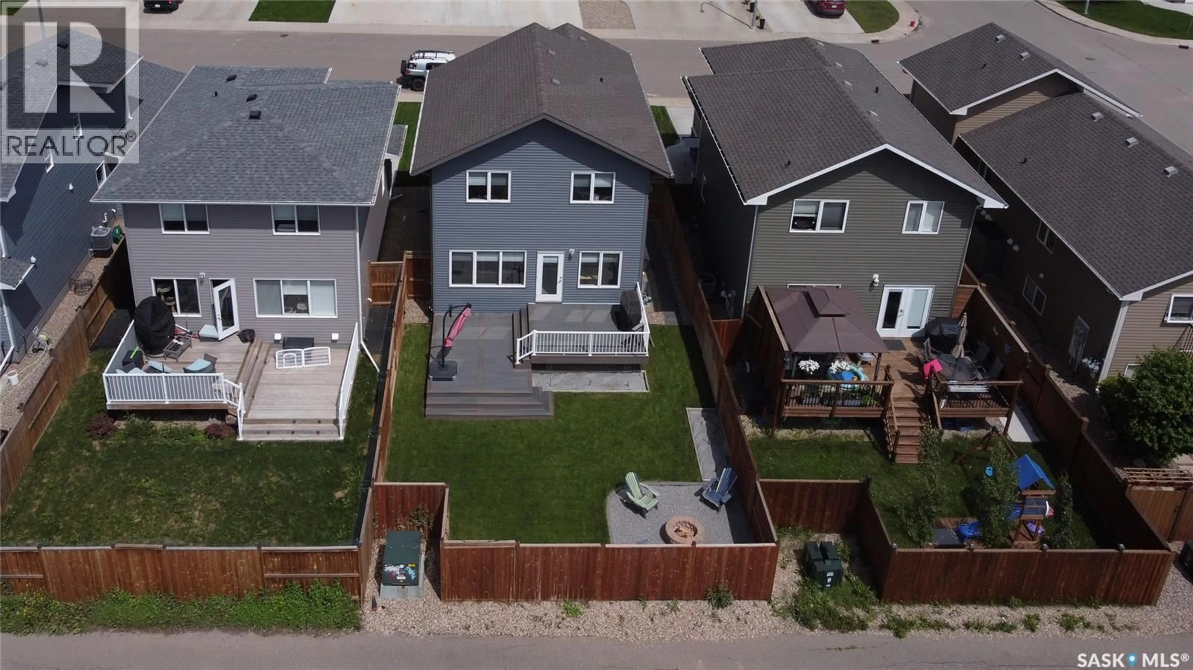 A pic from outside/outdoor area/front of a property/back of a property/a pic from drone, street for 158 COWAN CRESCENT, Martensville Saskatchewan S0K0A2