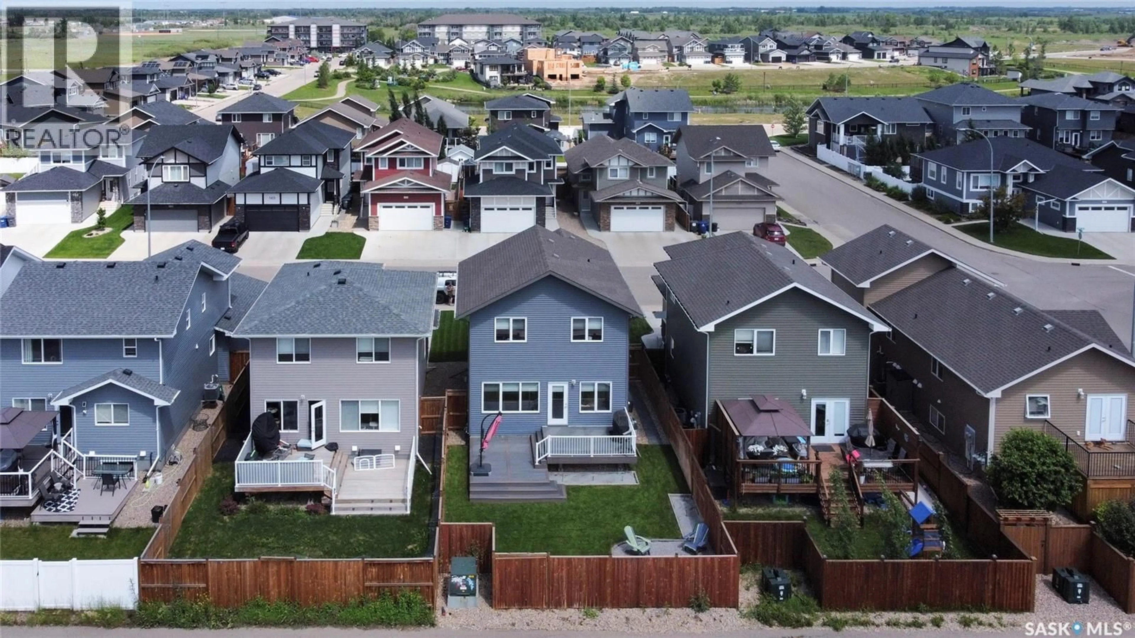 A pic from outside/outdoor area/front of a property/back of a property/a pic from drone, street for 158 COWAN CRESCENT, Martensville Saskatchewan S0K0A2
