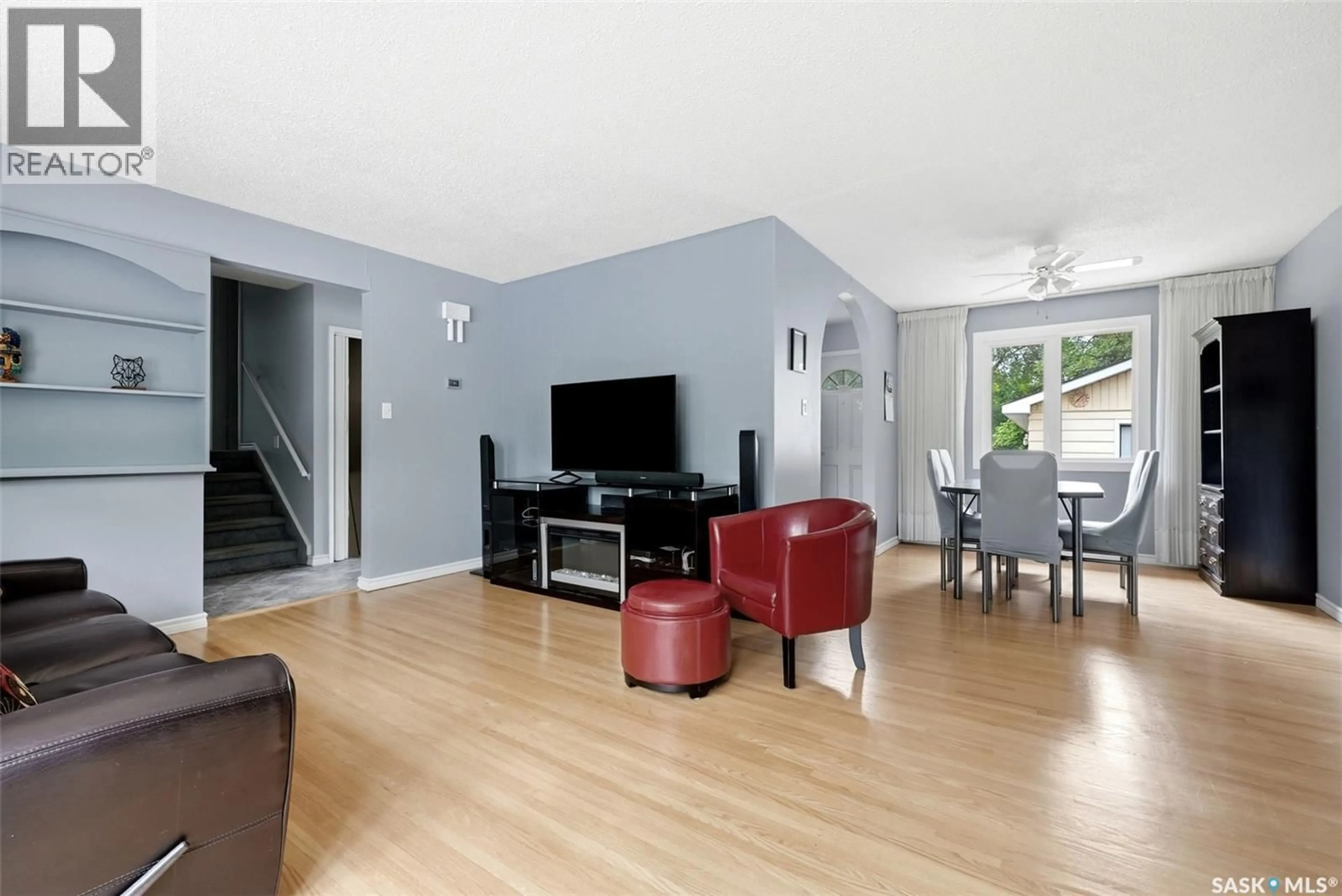 Living room with furniture, wood/laminate floor for 2305 PARLIAMENT AVENUE, Regina Saskatchewan S4S4G5