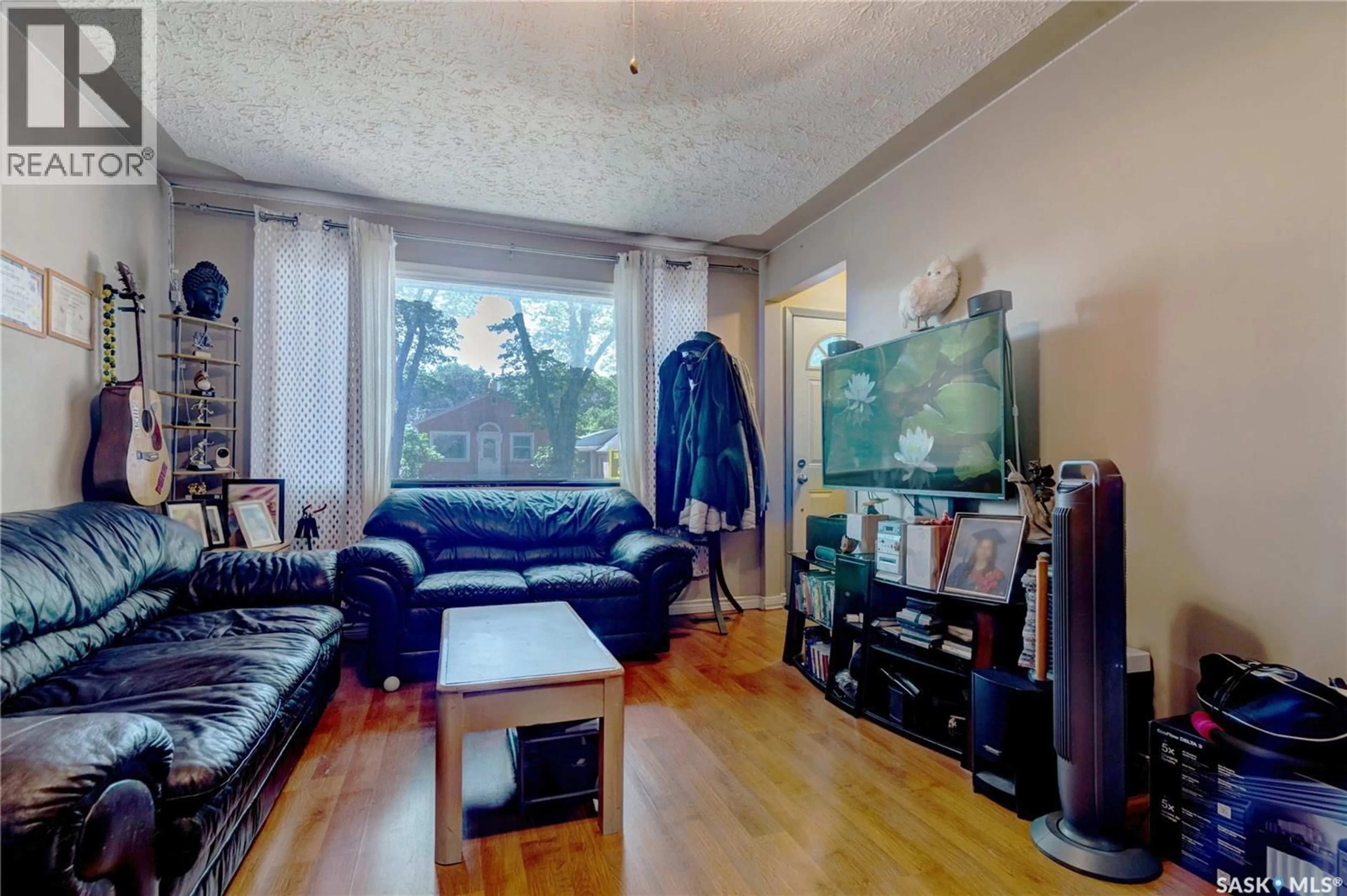 Living room with furniture, unknown for 1745 QUEBEC STREET, Regina Saskatchewan S4P1J4