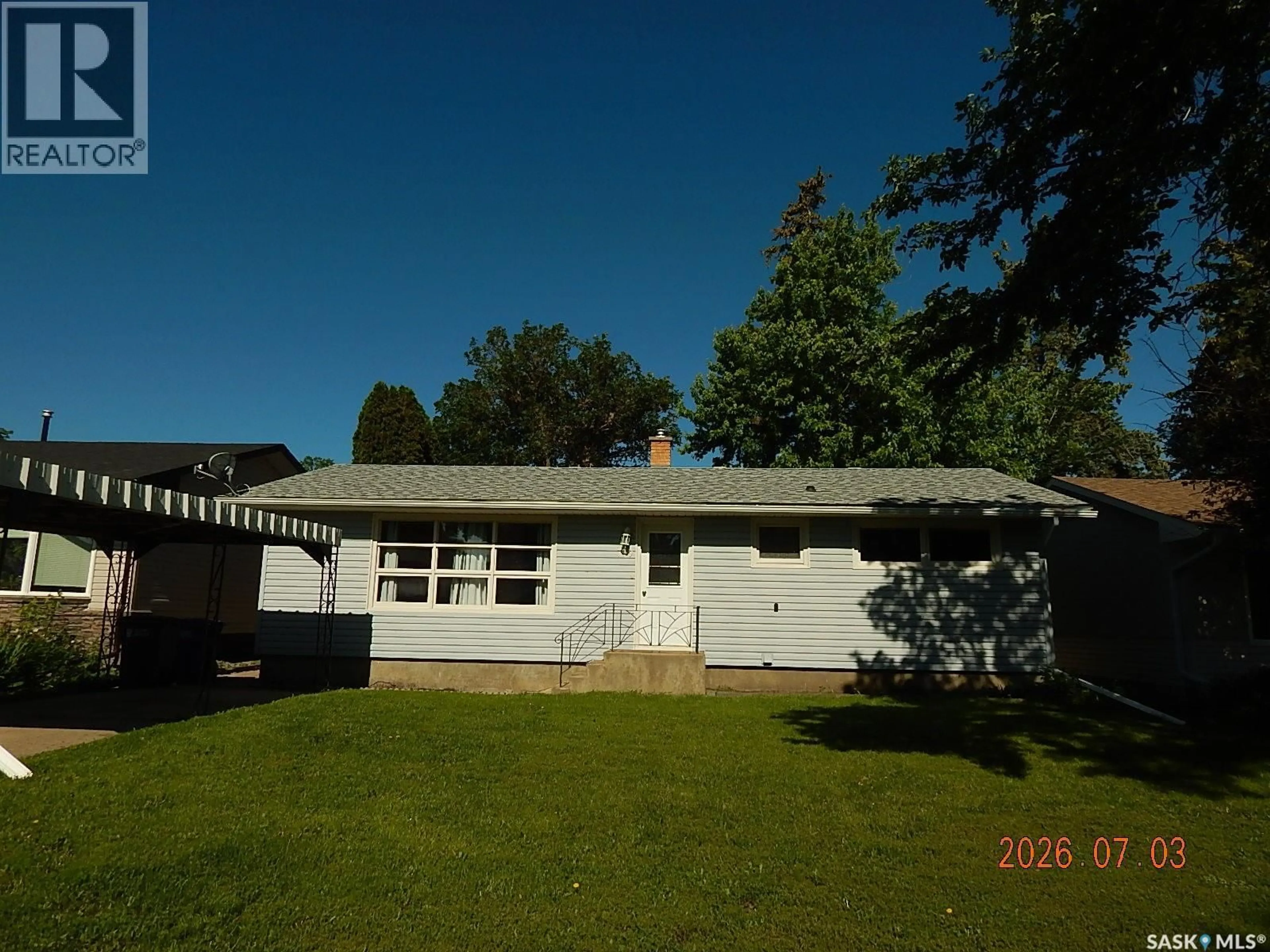 A pic from outside/outdoor area/front of a property/back of a property/a pic from drone, street for 710 3RD STREET E, Assiniboia Saskatchewan S0H0B0