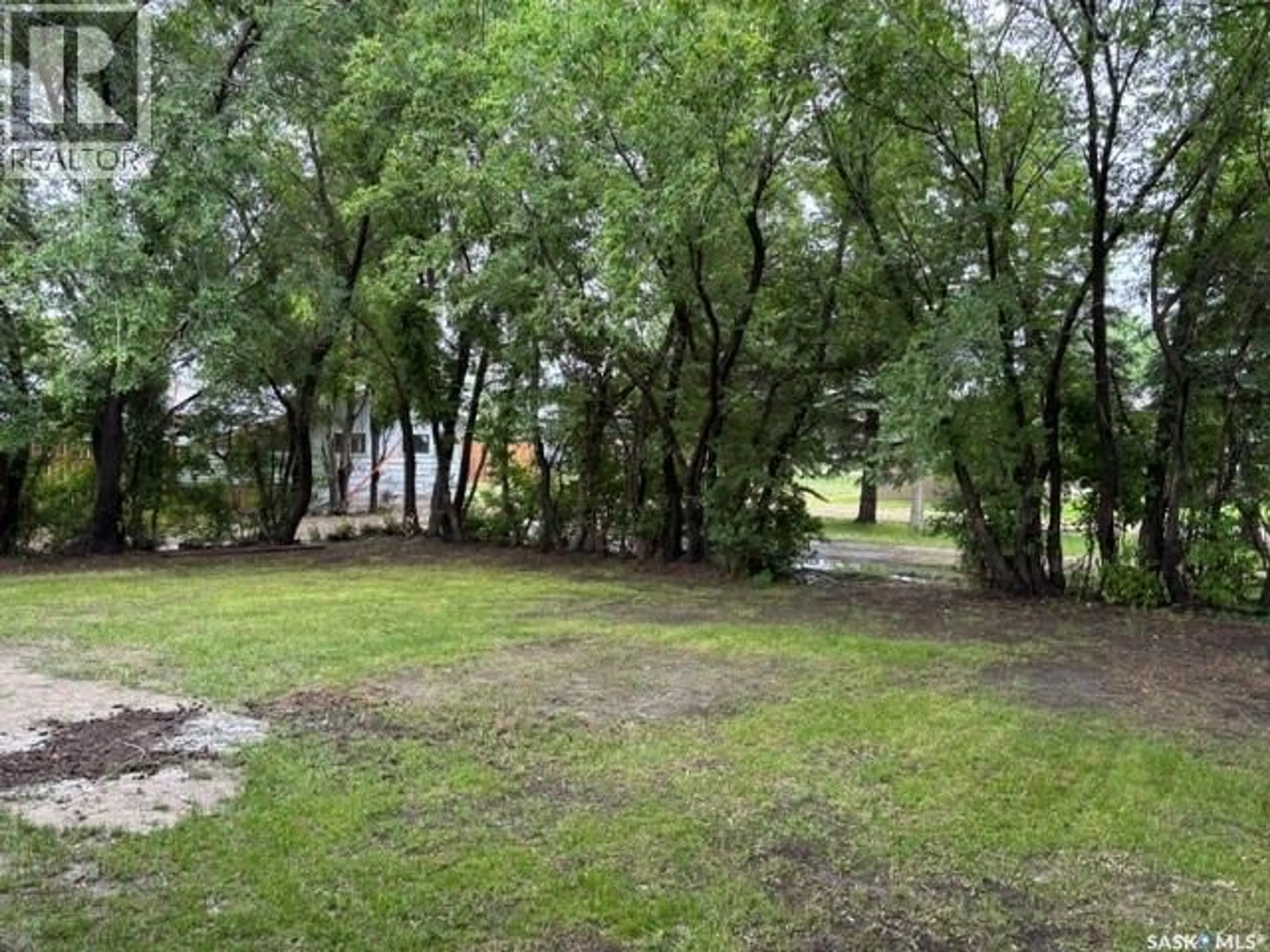A pic from outside/outdoor area/front of a property/back of a property/a pic from drone, forest/trees view for 12 ROBERTS STREET, Redvers Saskatchewan S0C2H0