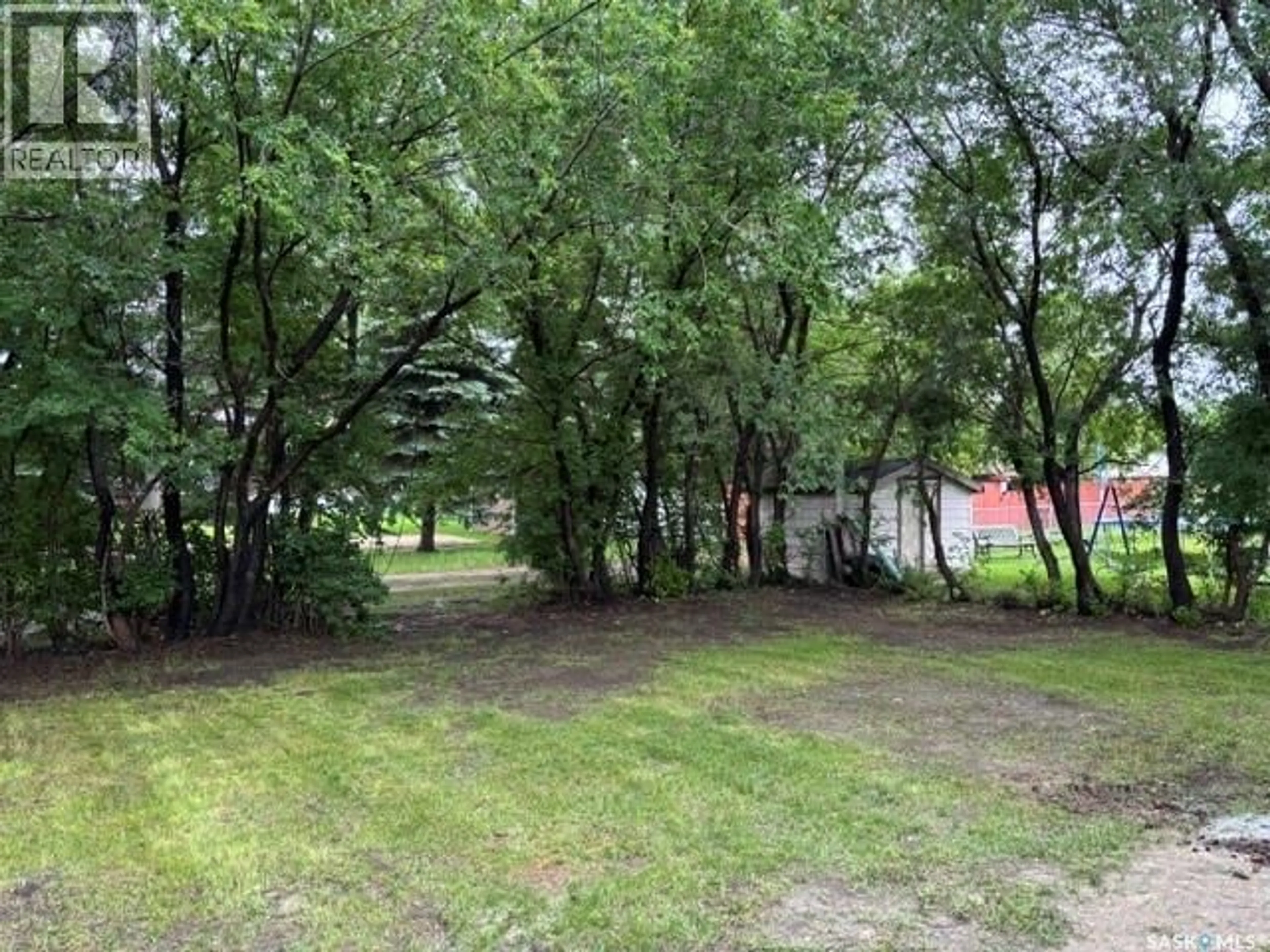 A pic from outside/outdoor area/front of a property/back of a property/a pic from drone, forest/trees view for 12 ROBERTS STREET, Redvers Saskatchewan S0C2H0