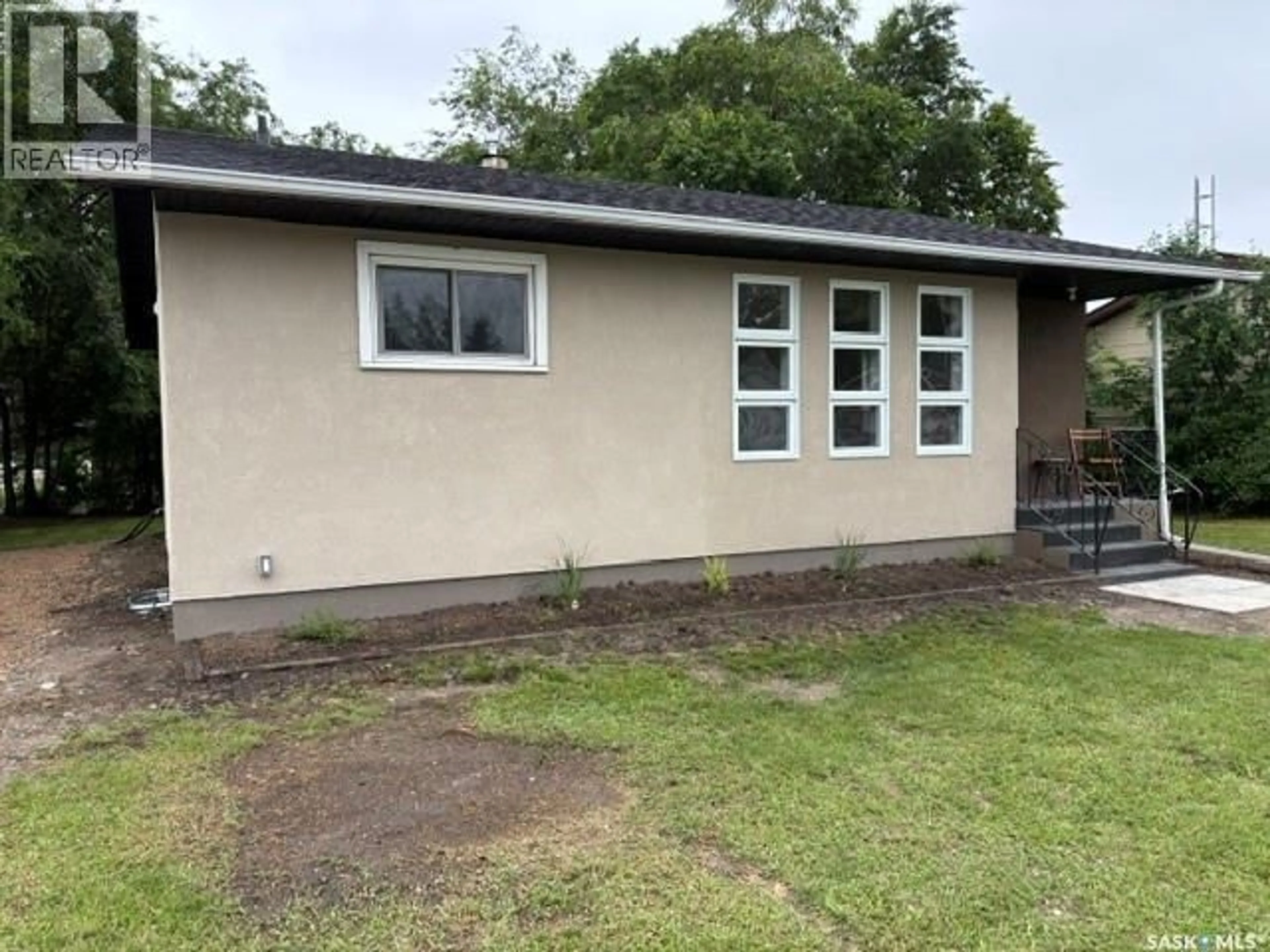 A pic from outside/outdoor area/front of a property/back of a property/a pic from drone, building for 12 ROBERTS STREET, Redvers Saskatchewan S0C2H0