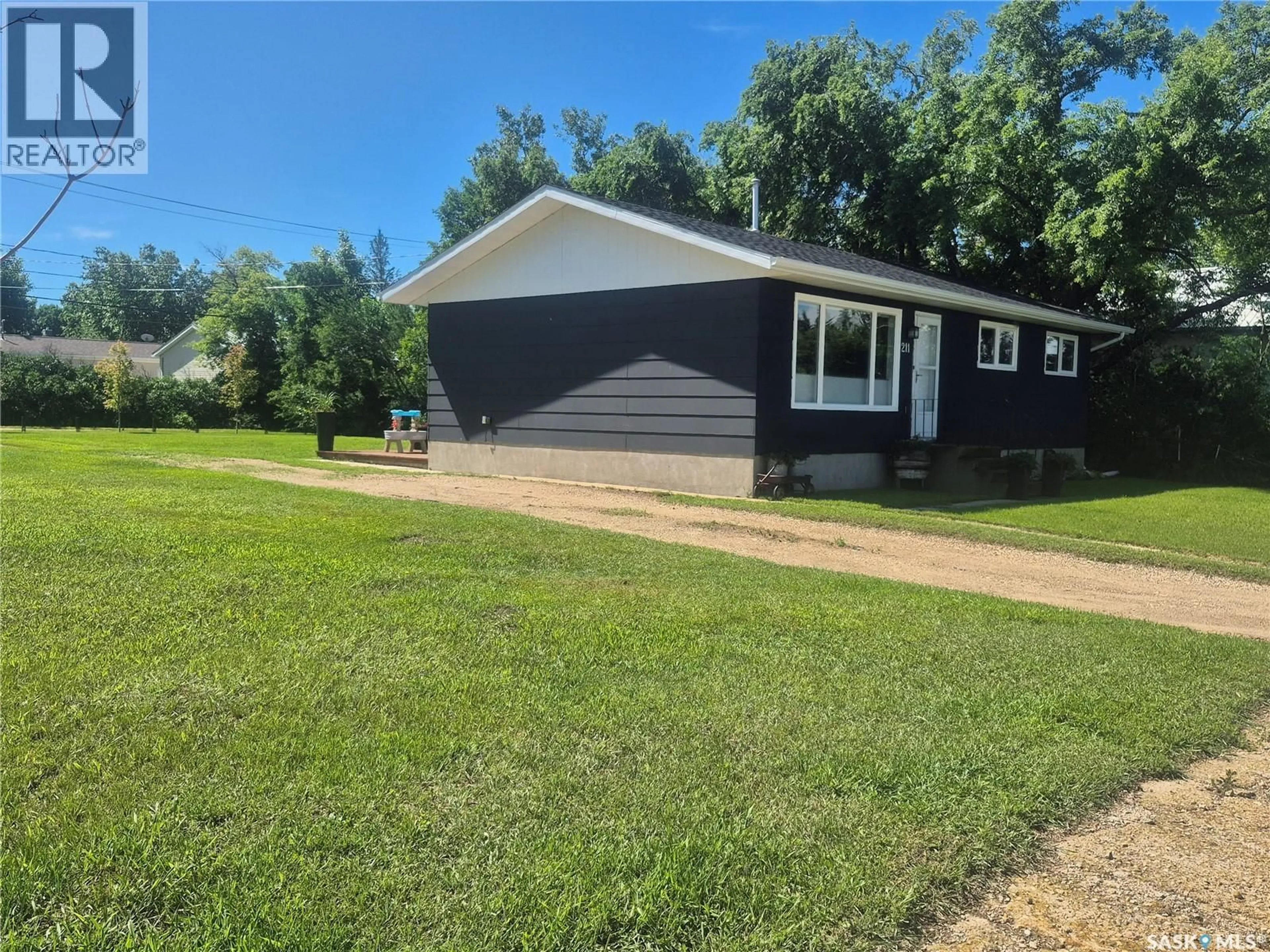 Home with vinyl exterior material, street for 205 & 211 MAIN STREET, Ceylon Saskatchewan S0C0T0