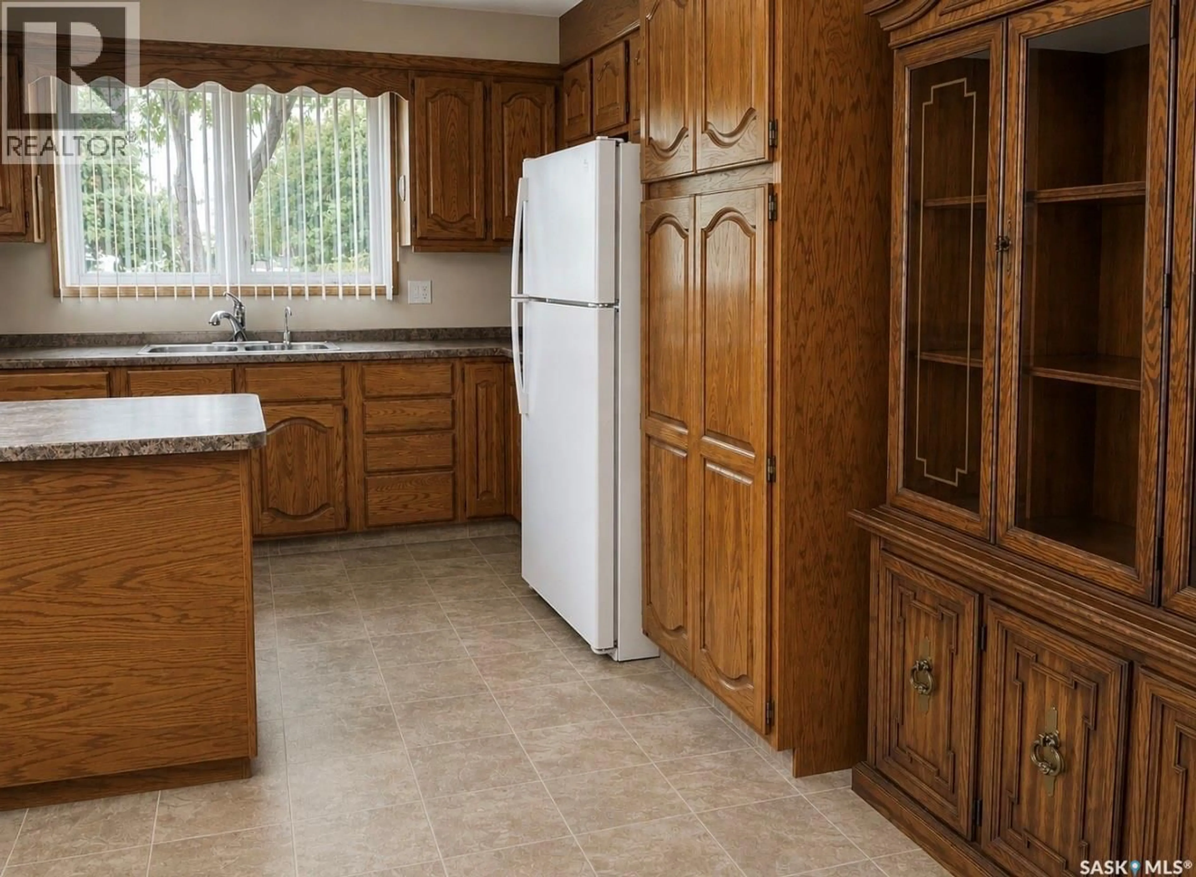 Standard kitchen, ceramic/tile floor for 407 7TH AVENUE, Assiniboia Saskatchewan S0H0B0