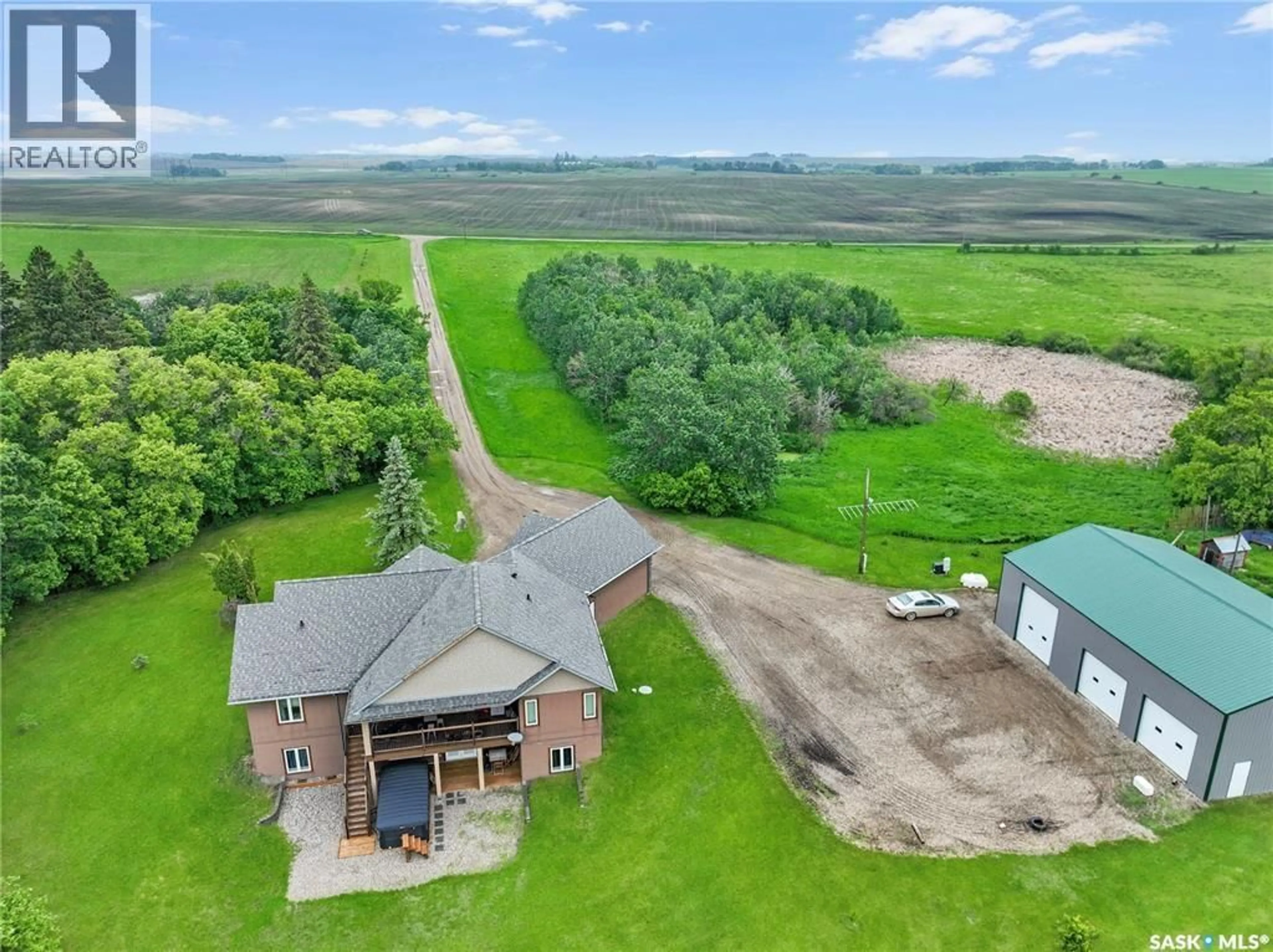 A pic from outside/outdoor area/front of a property/back of a property/a pic from drone, water/lake/river/ocean view for HOLARS HAVEN ACREAGE, Spy Hill Rm No. 152 Saskatchewan S0A4B0
