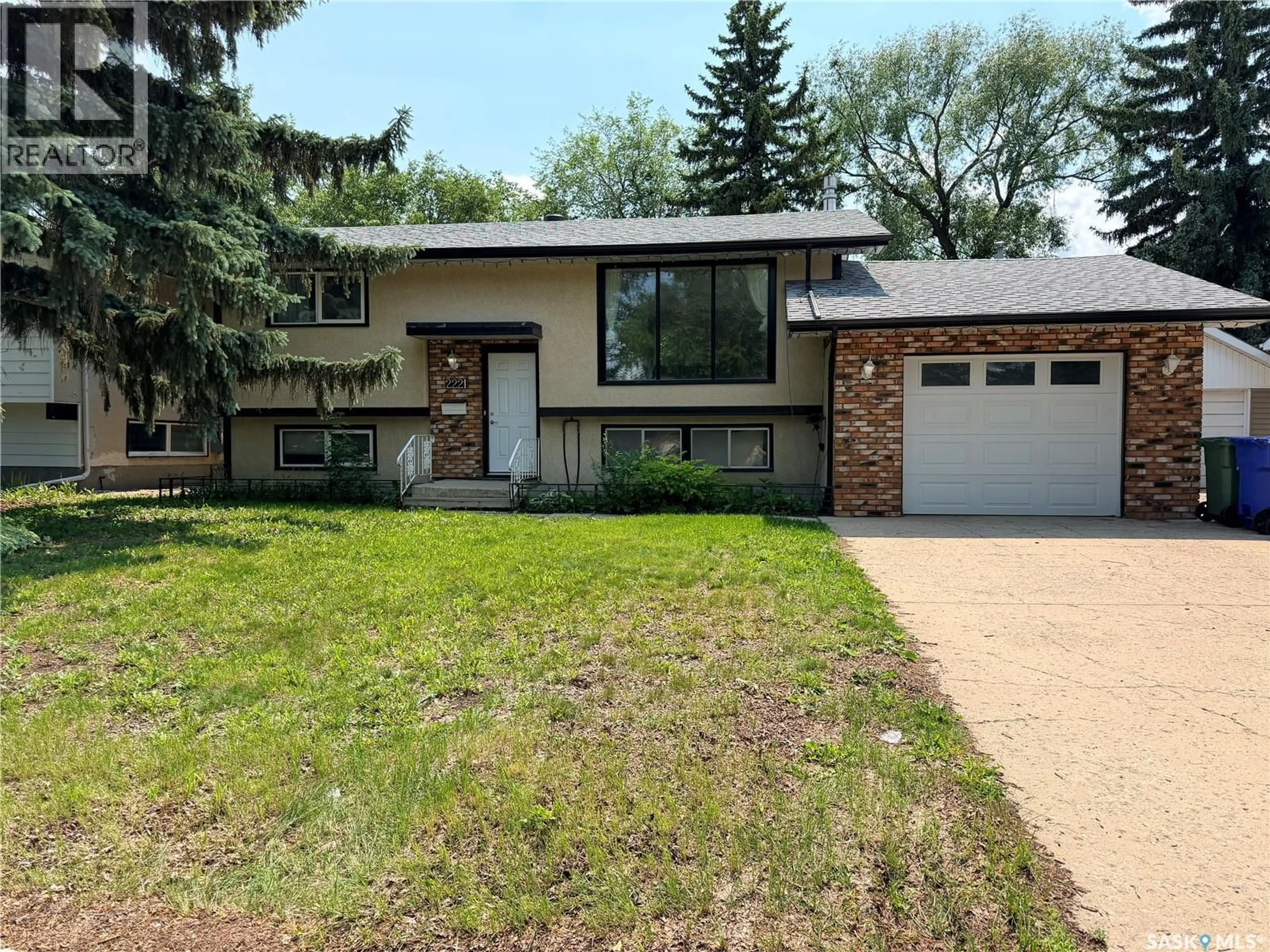 Home with vinyl exterior material, street for 2221 BEDFORD AVENUE, Regina Saskatchewan S4N0H1