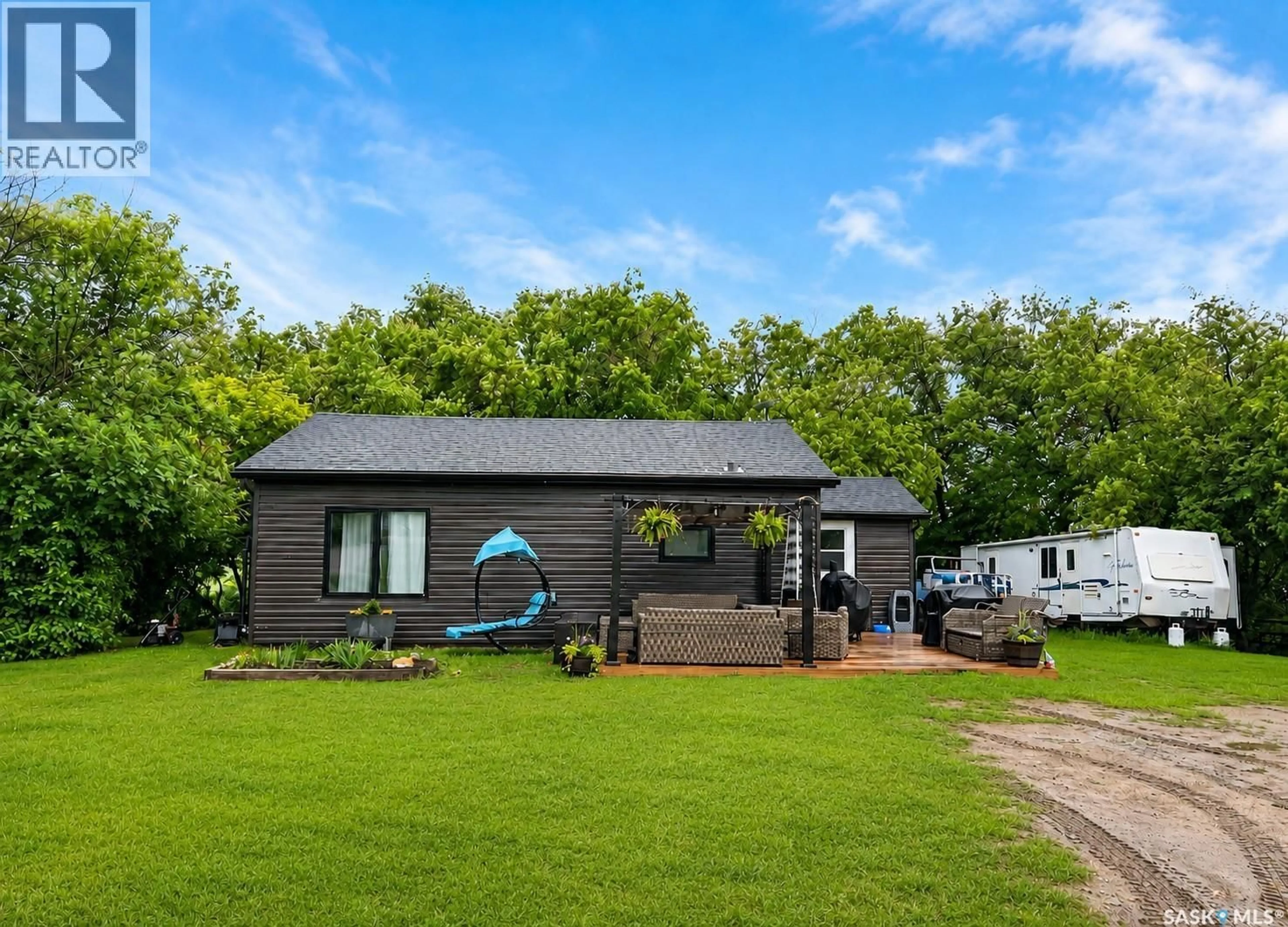 A pic from outside/outdoor area/front of a property/back of a property/a pic from drone, unknown for WHITE ACREAGE, Canwood Rm No. 494 Saskatchewan S0J2E0