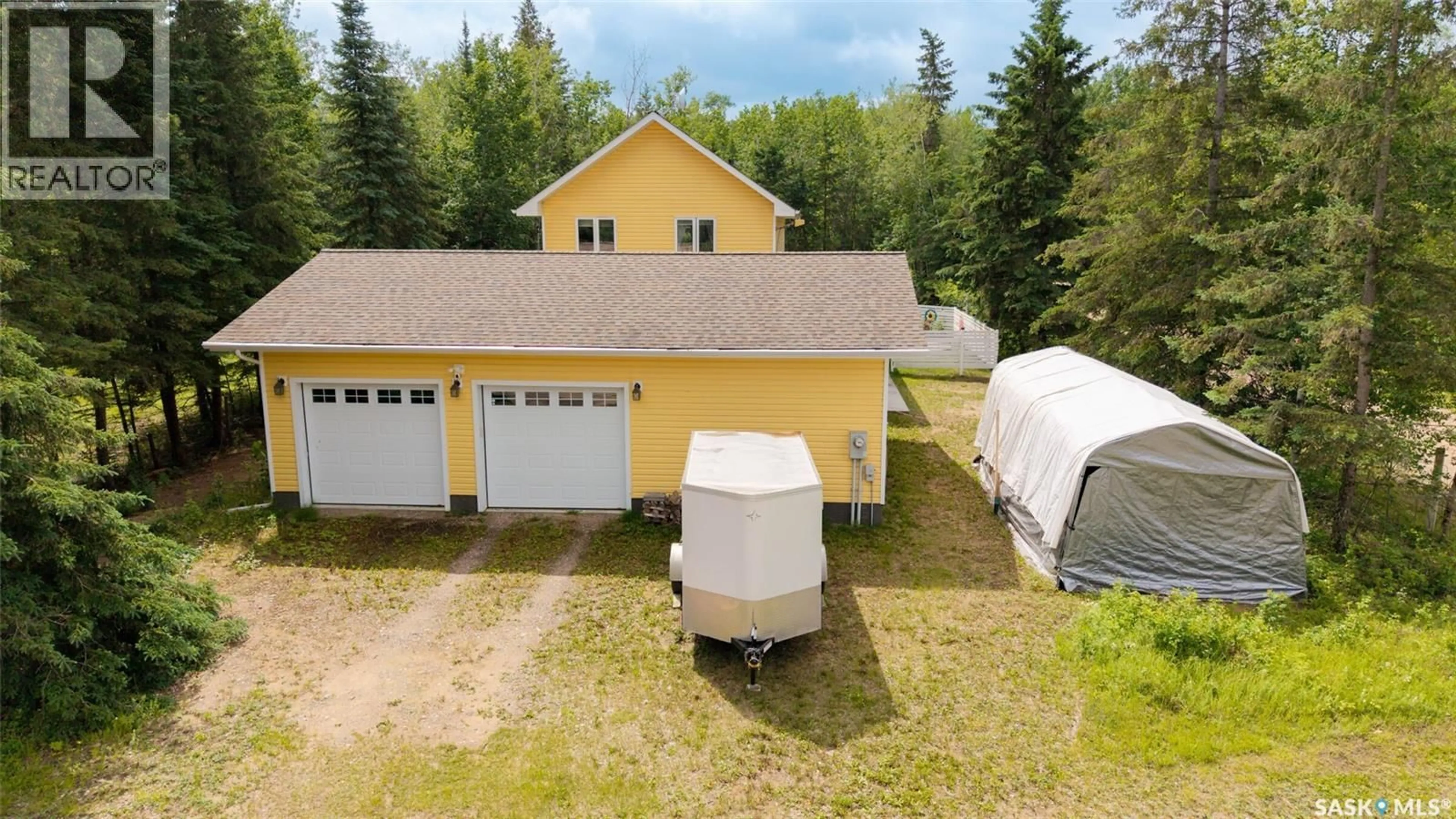 A pic from outside/outdoor area/front of a property/back of a property/a pic from drone, building for 301 CHRISTEL CRESCENT, Beaver River Rm No. 622 Saskatchewan S0M1A0