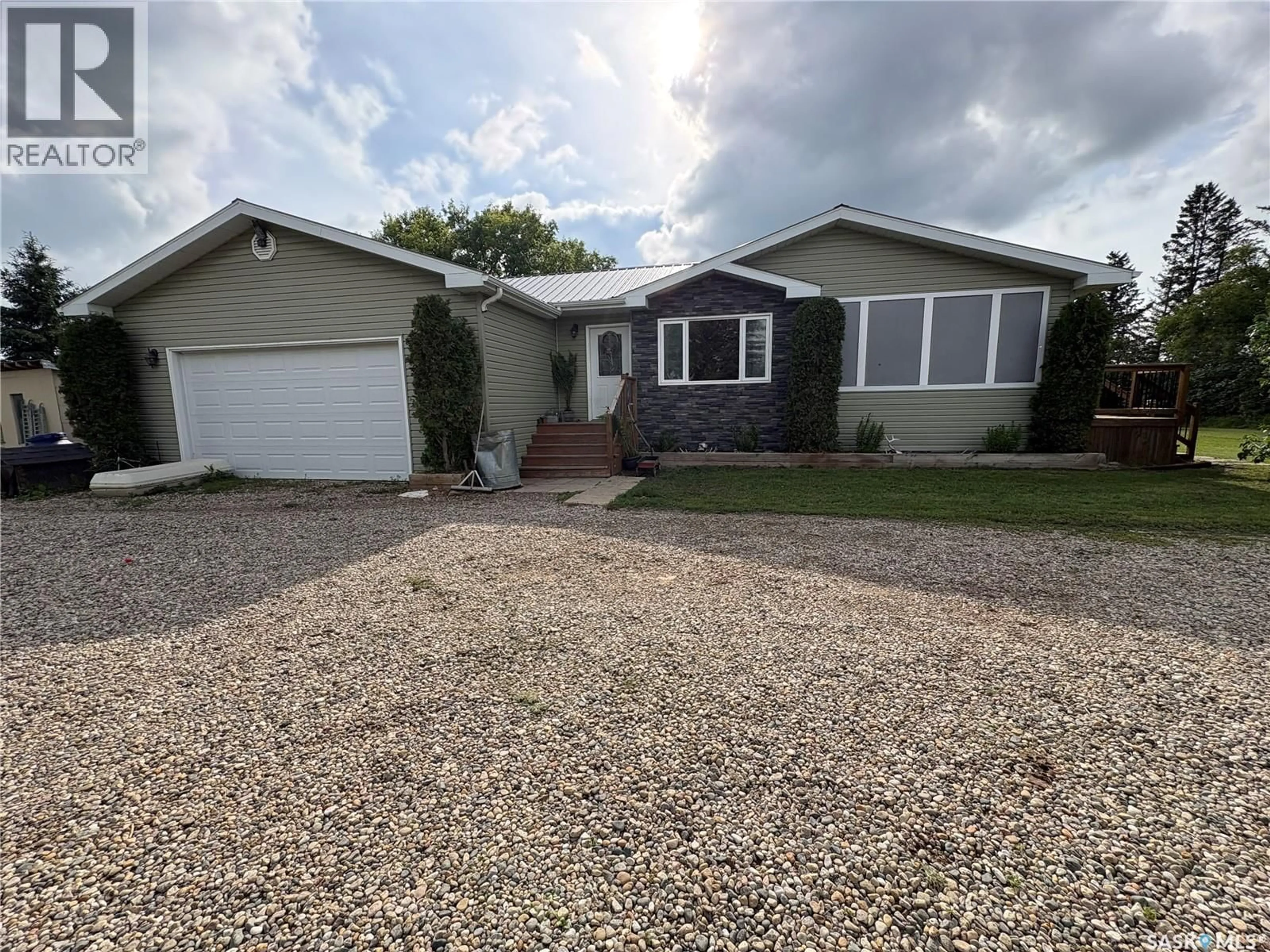 Home with vinyl exterior material, street for KAMSACK ACREAGE, Cote Rm No. 271 Saskatchewan S0A1S0