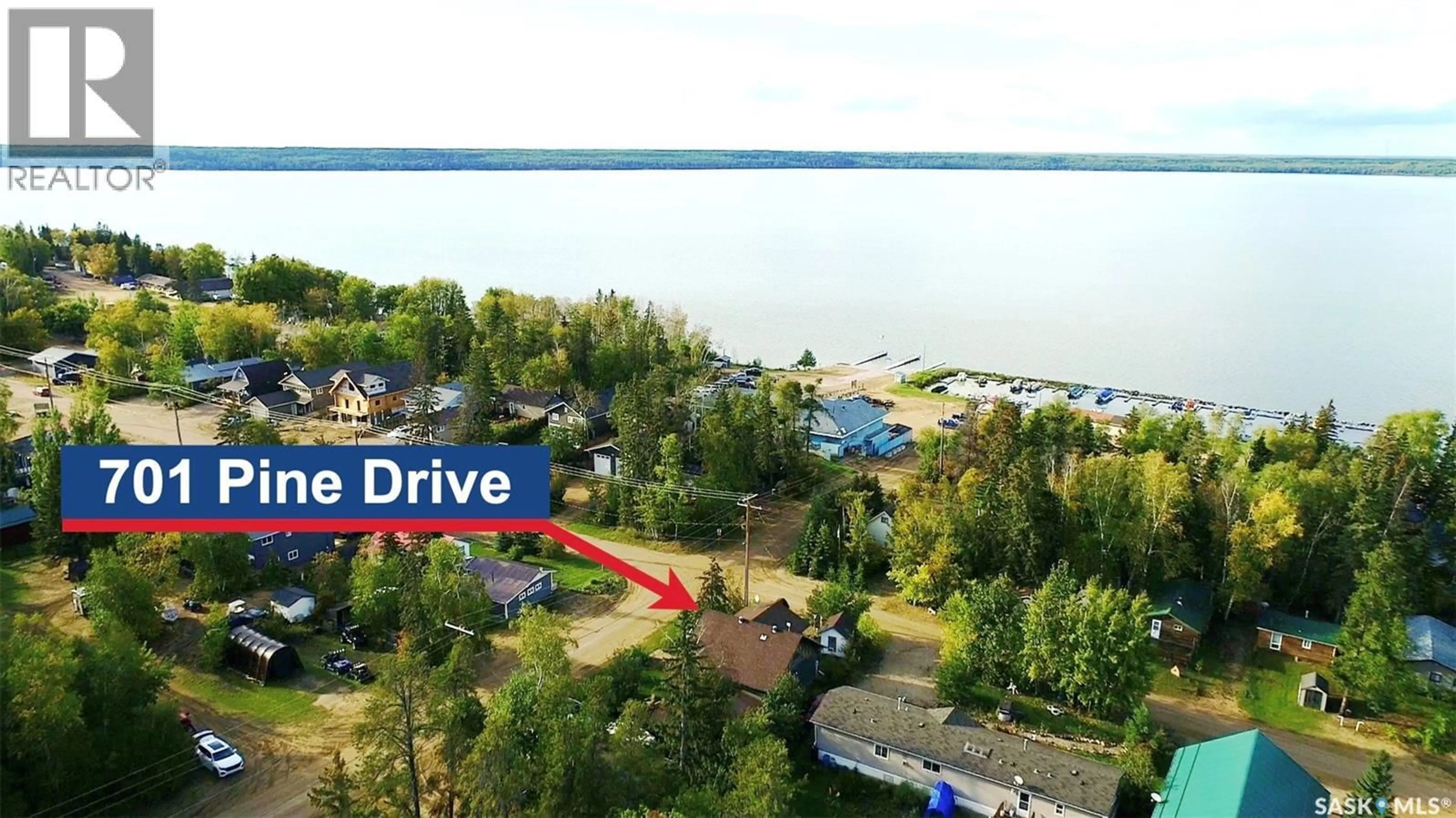 A pic from outside/outdoor area/front of a property/back of a property/a pic from drone, water/lake/river/ocean view for 701 PINE DRIVE, Tobin Lake Saskatchewan S0E1E0