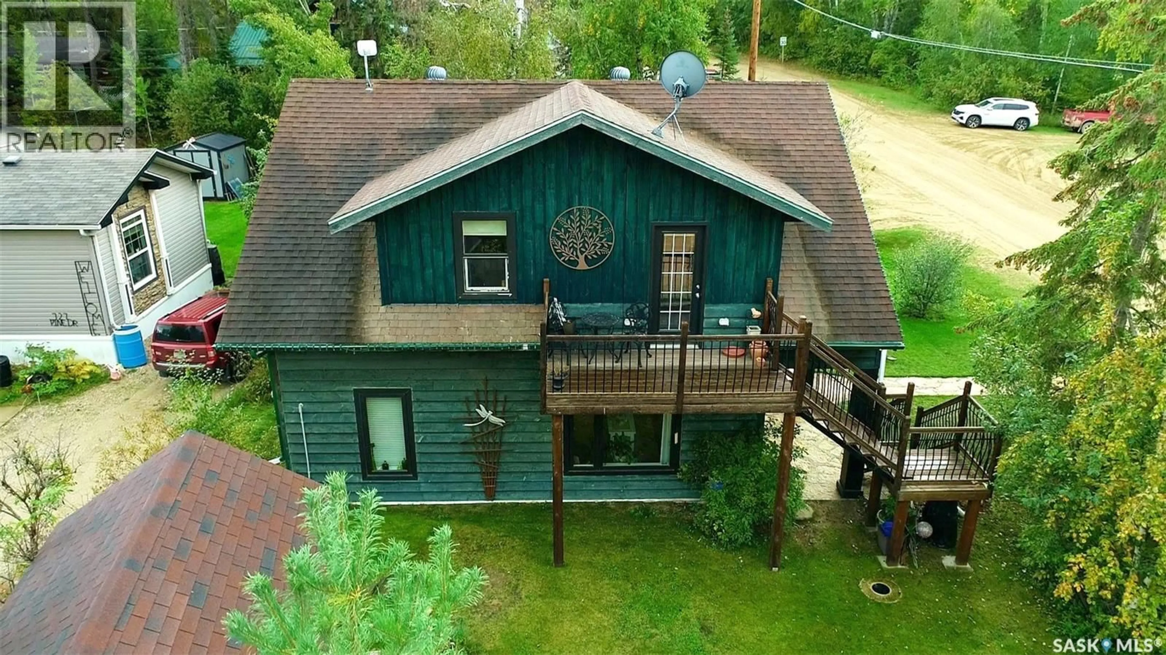 A pic from outside/outdoor area/front of a property/back of a property/a pic from drone, unknown for 701 PINE DRIVE, Tobin Lake Saskatchewan S0E1E0
