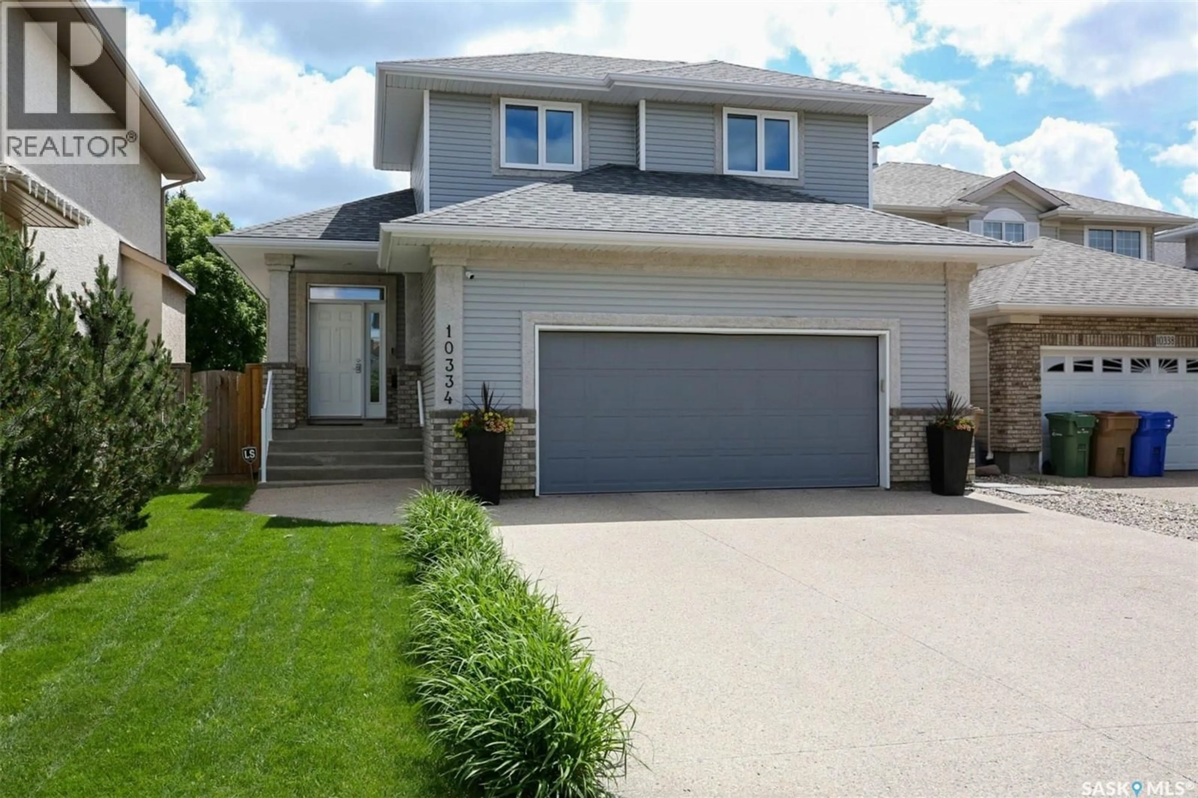 Home with vinyl exterior material, street for 10334 WASCANA ESTATES, Regina Saskatchewan S4V2X1