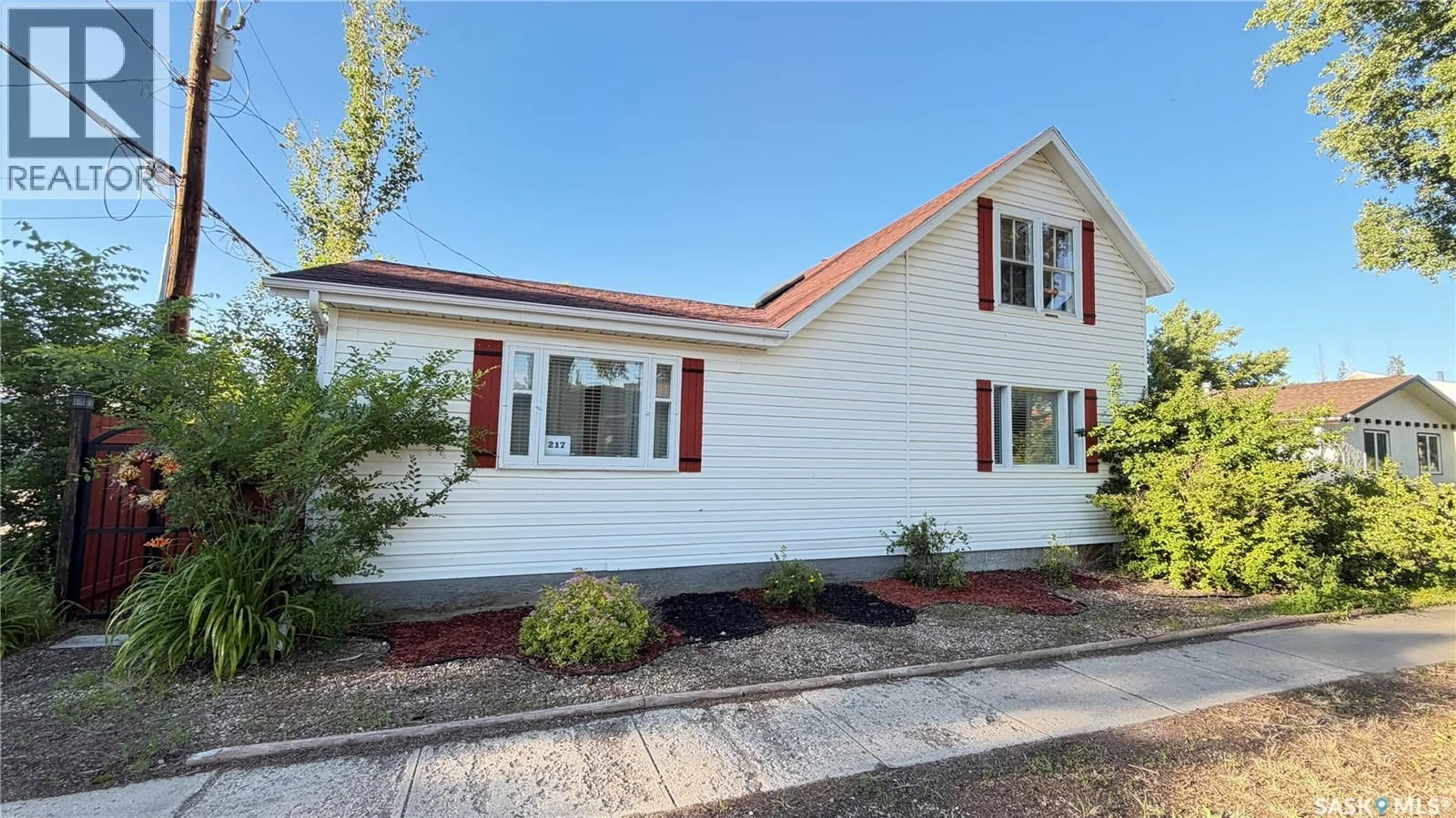 Home with vinyl exterior material, street for 217 2ND AVENUE, Maple Creek Saskatchewan S0N1N0