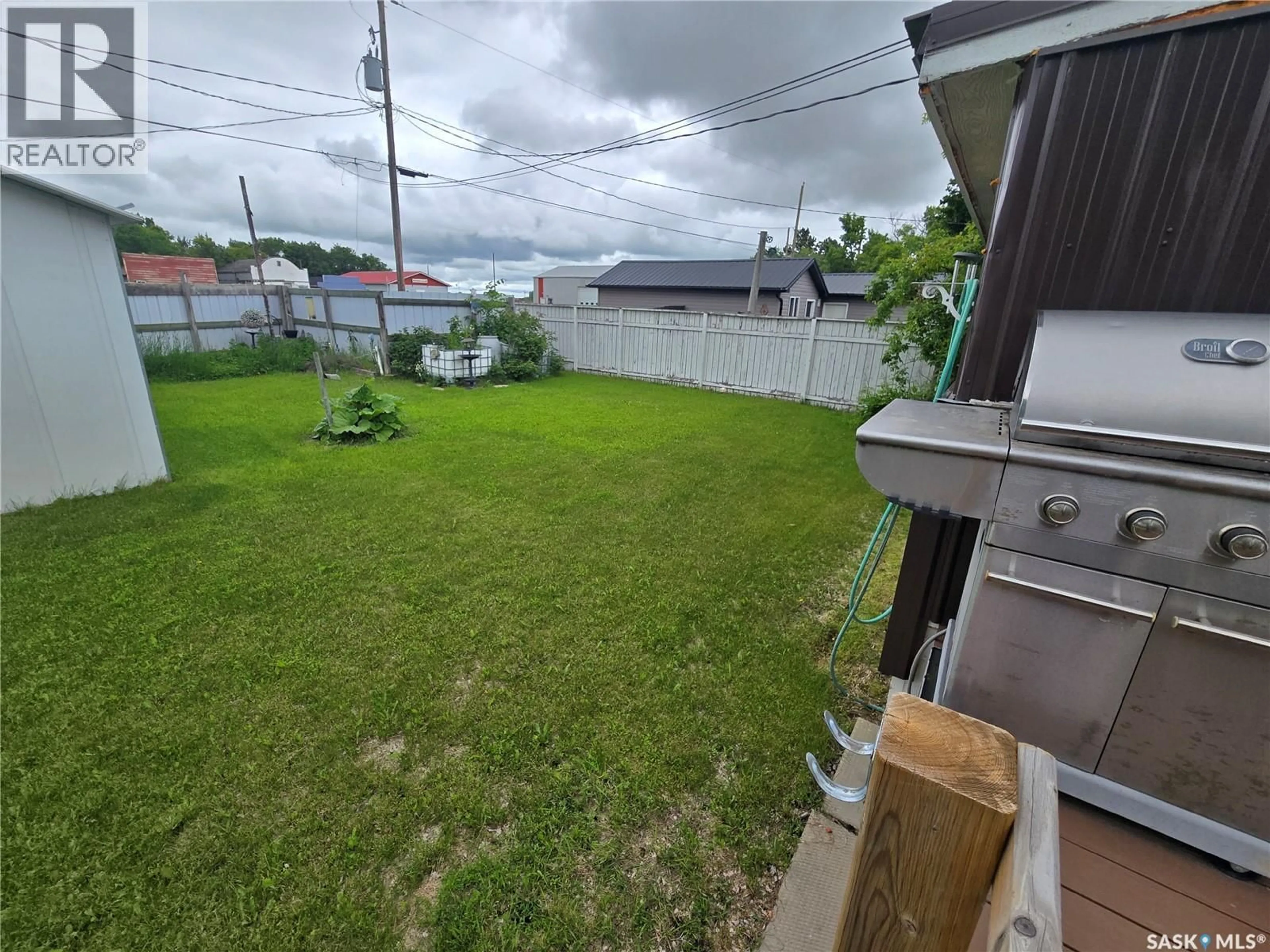 A pic from outside/outdoor area/front of a property/back of a property/a pic from drone, street for 216 SCOTT STREET, Kennedy Saskatchewan S0G2R0