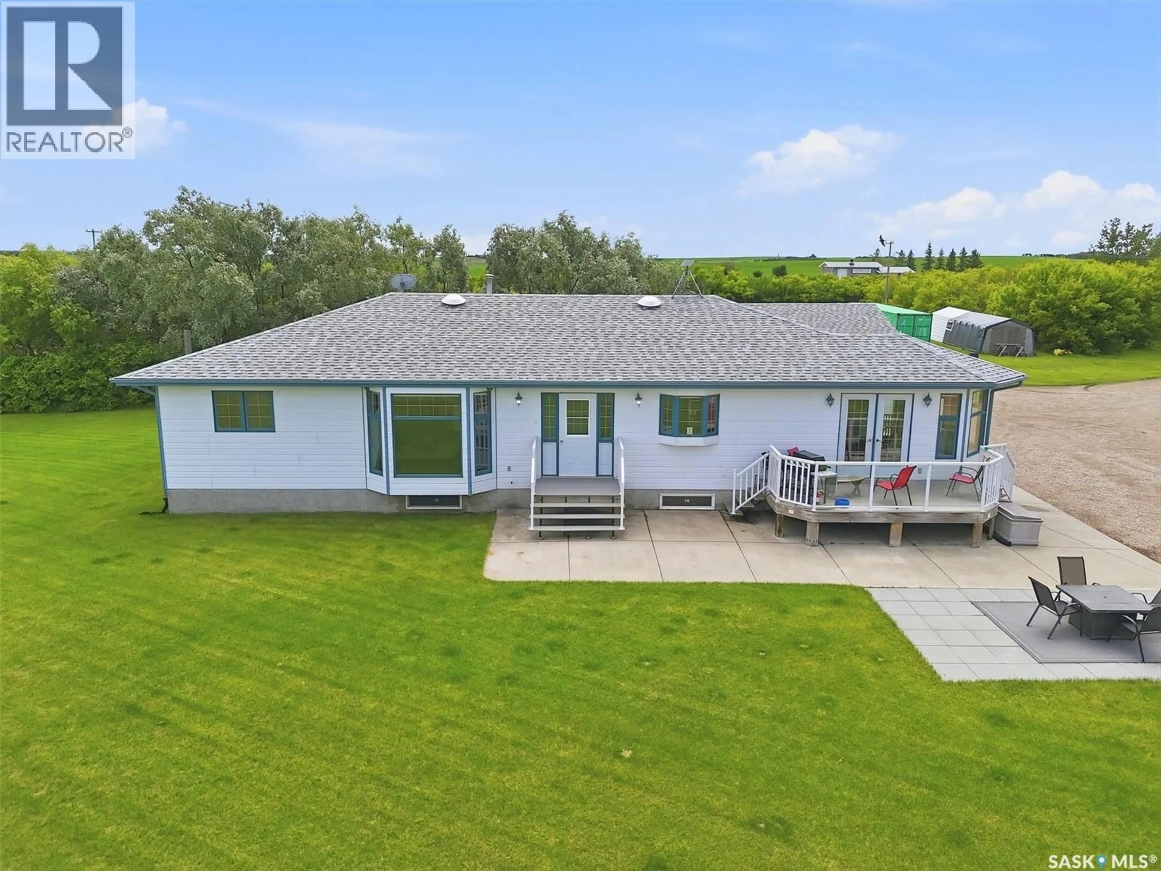 A pic from outside/outdoor area/front of a property/back of a property/a pic from drone, water/lake/river/ocean view for 17515 HIGHWAY 5 ACREAGE, Aberdeen Rm No. 373 Saskatchewan S7A0A9