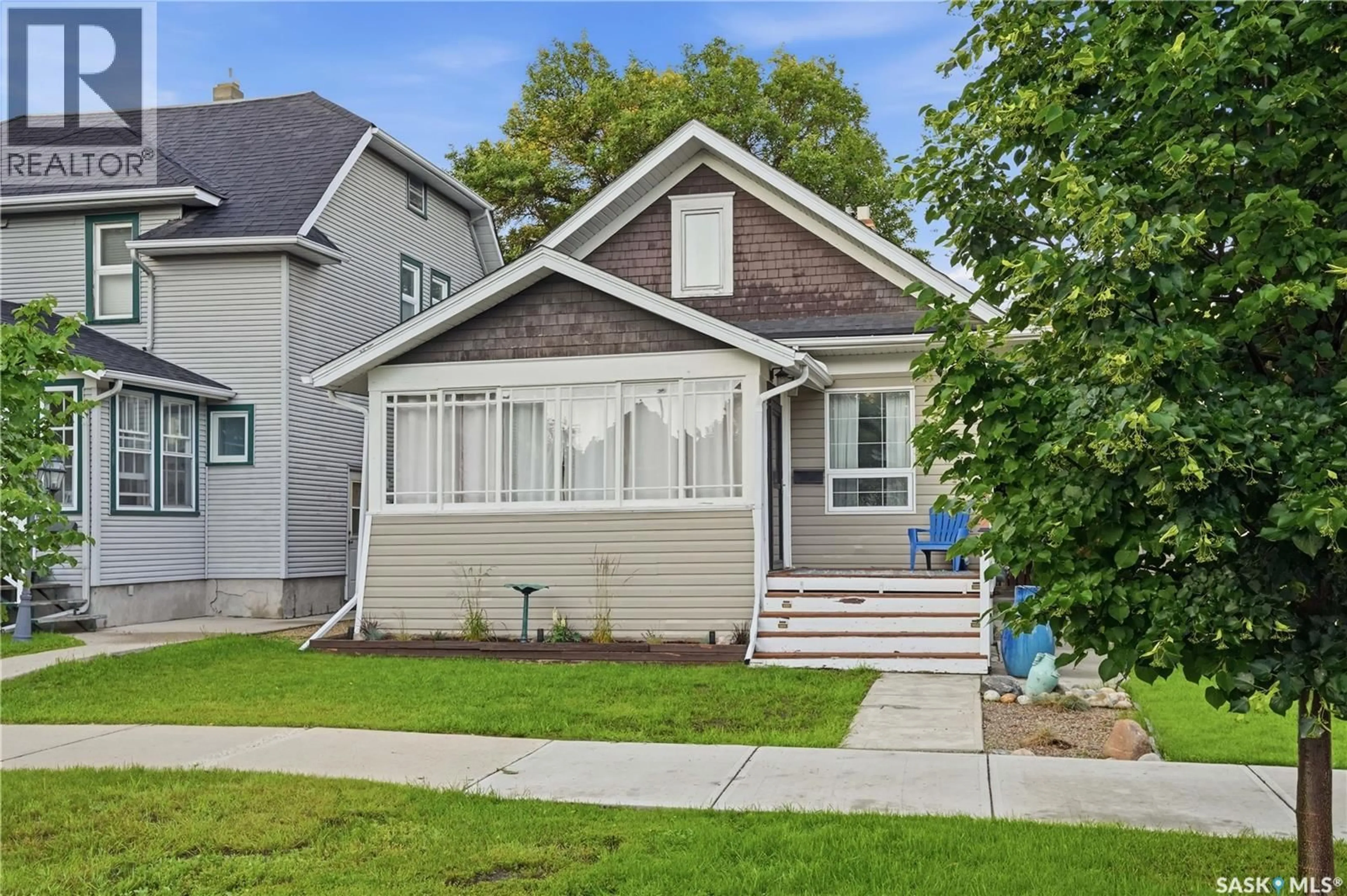 Home with vinyl exterior material, street for 1157 3RD AVENUE, Moose Jaw Saskatchewan S6H3V1