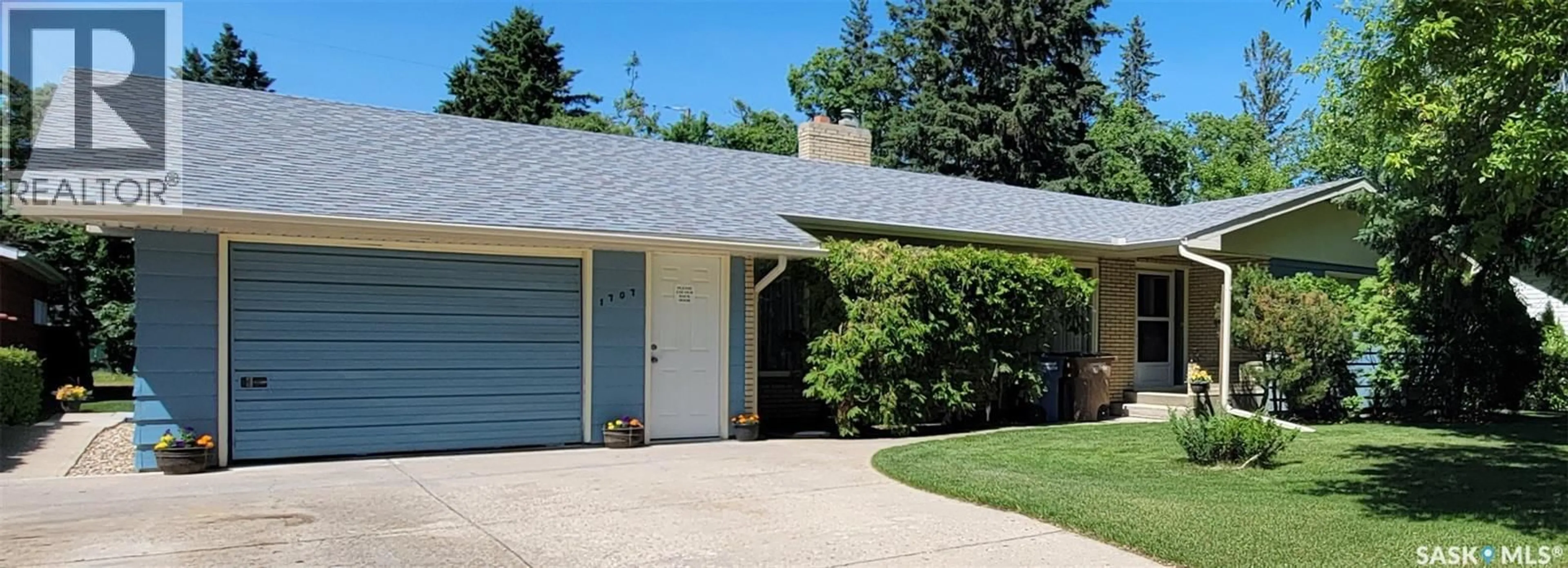 Home with vinyl exterior material, street for 1707 98TH STREET, Tisdale Saskatchewan S0E1T0