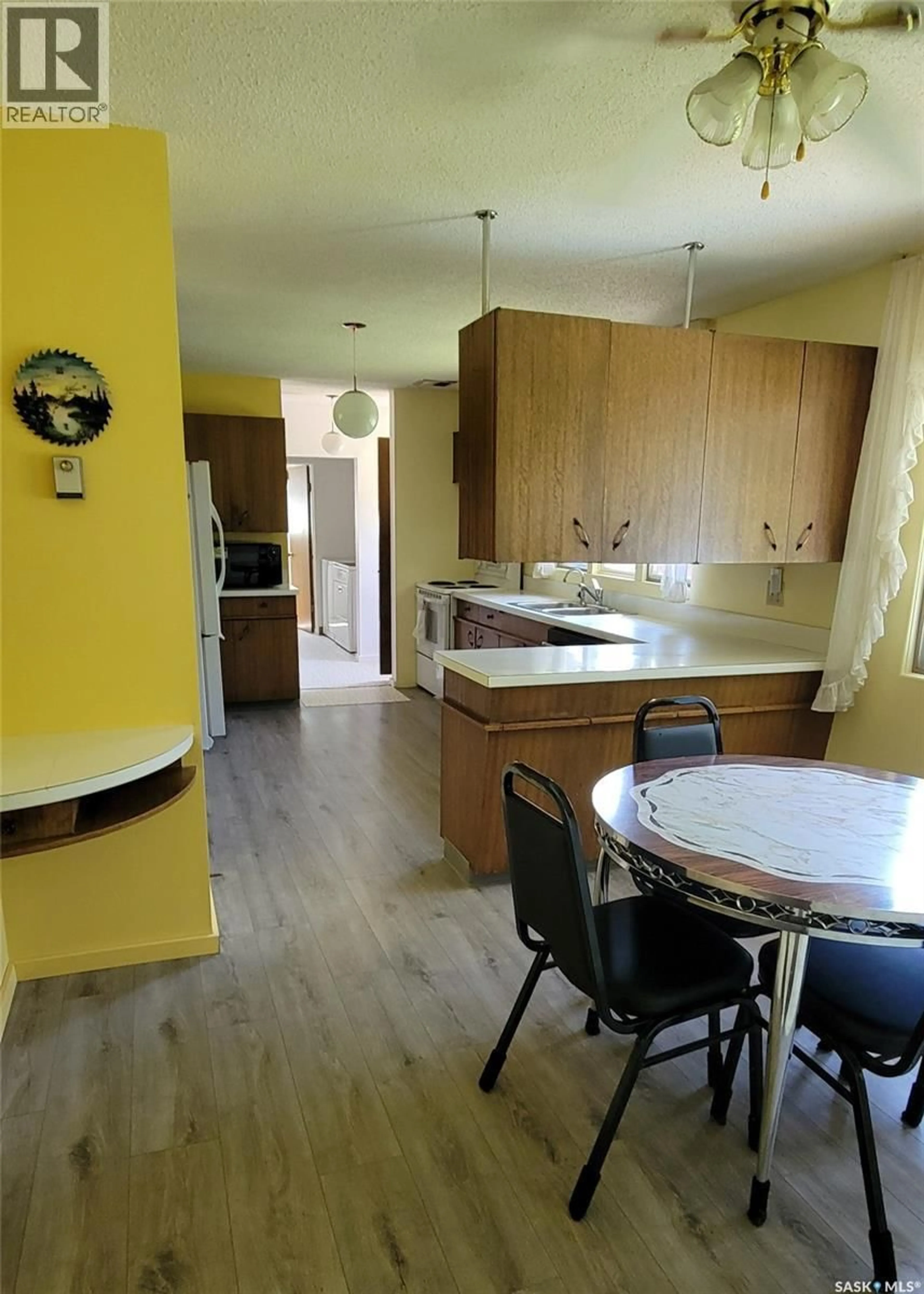Open concept kitchen, unknown for 1707 98TH STREET, Tisdale Saskatchewan S0E1T0