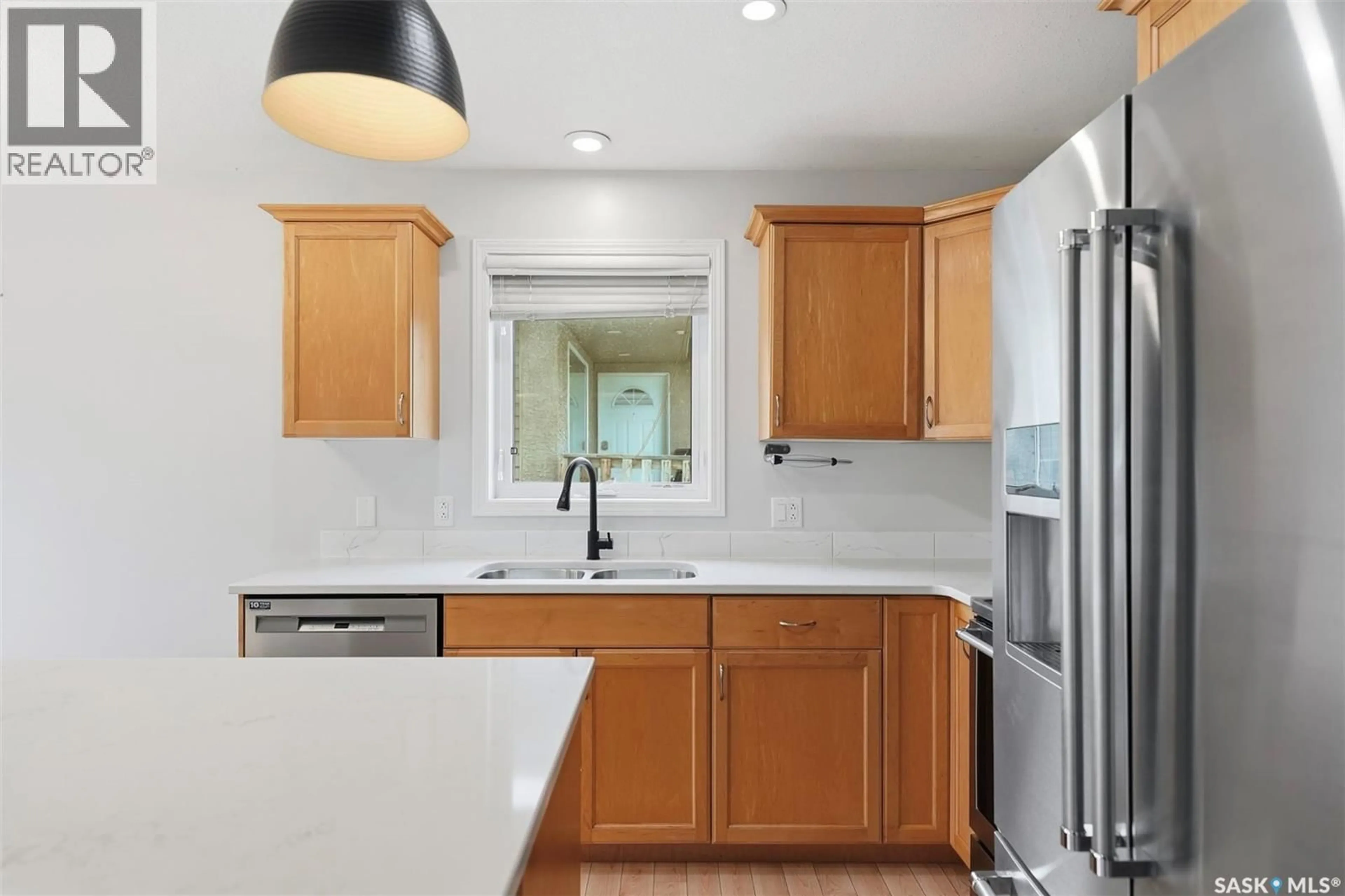 Open concept kitchen, ceramic/tile floor for 125 MEADOWLARK PARK, Warman Saskatchewan S0K0A1