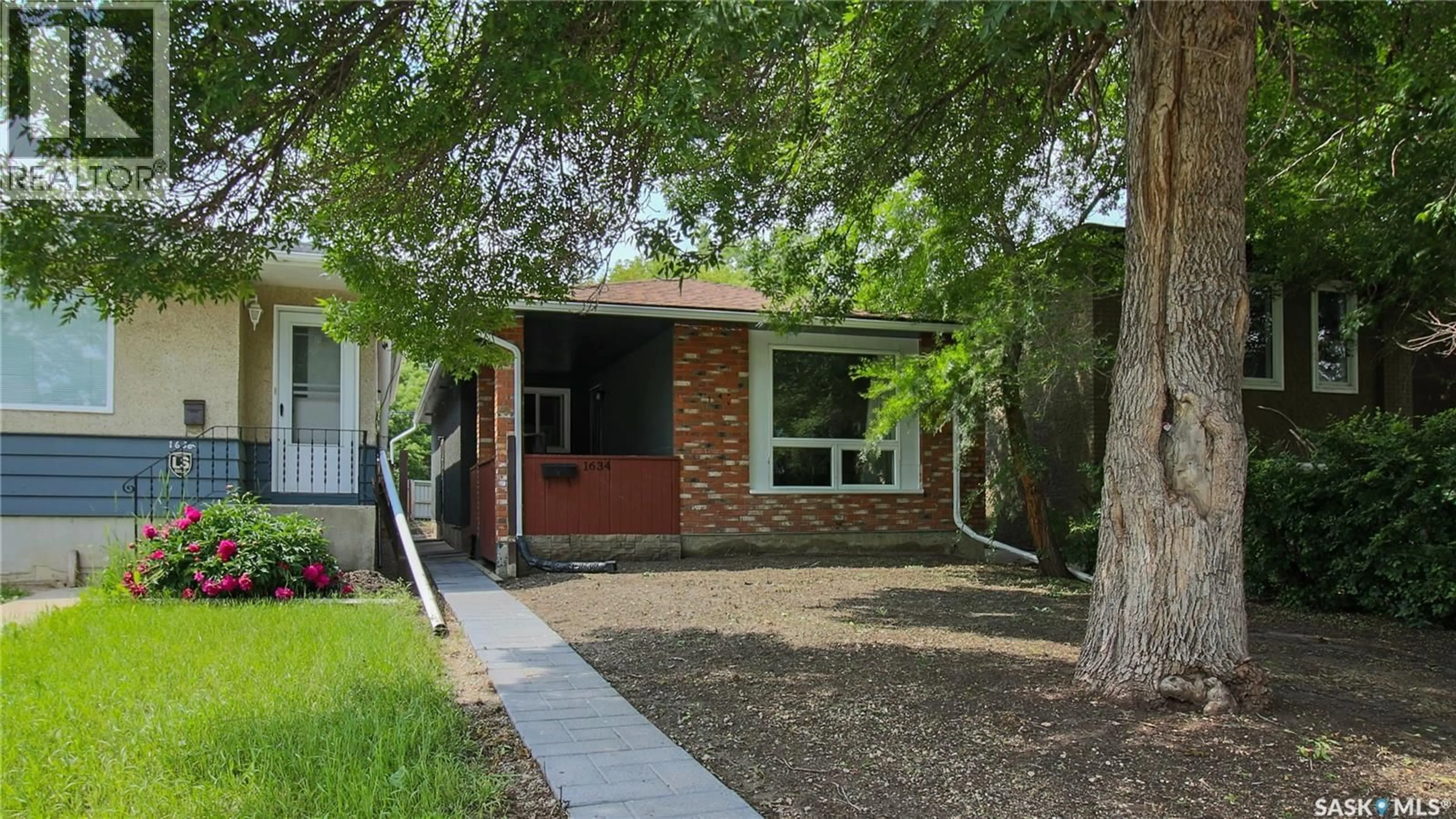 Home with brick exterior material, street for 1634 RAE STREET, Regina Saskatchewan S4T2E1