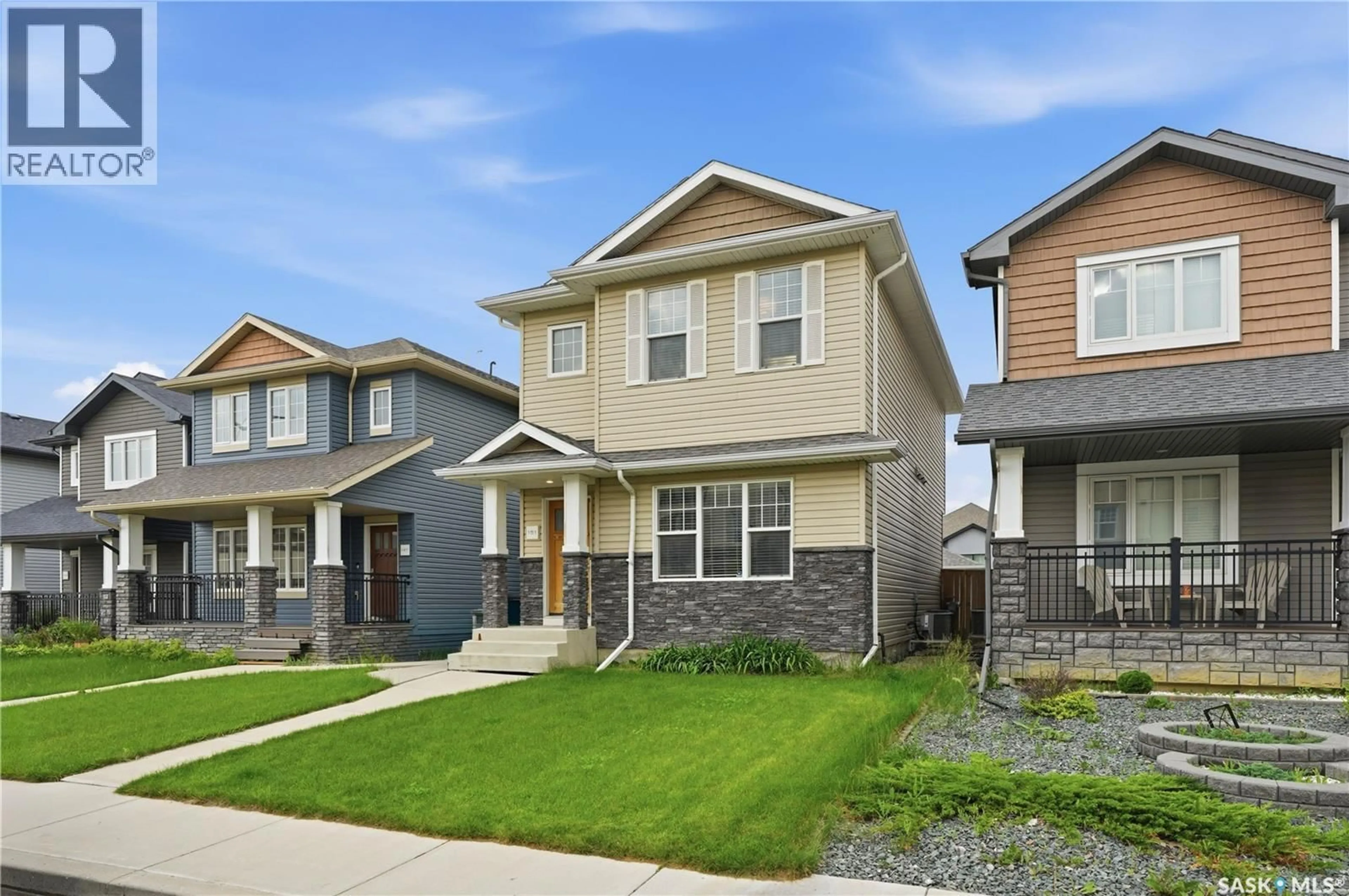 Home with vinyl exterior material, street for 151 TWEED LANE, Saskatoon Saskatchewan S7V0K1