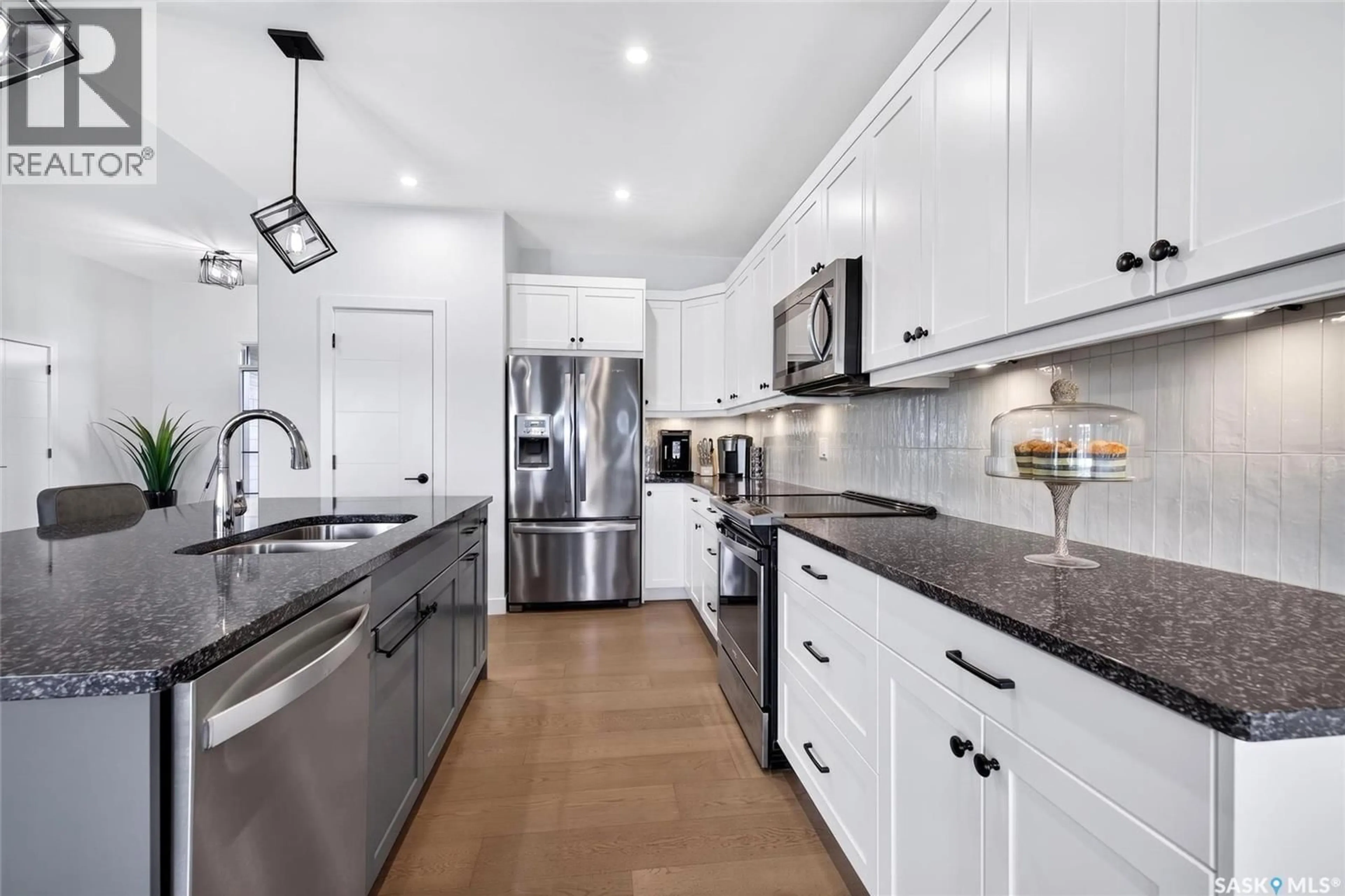 Contemporary kitchen, ceramic/tile floor for 214 SETTLER CRESCENT, Warman Saskatchewan S0K4S5