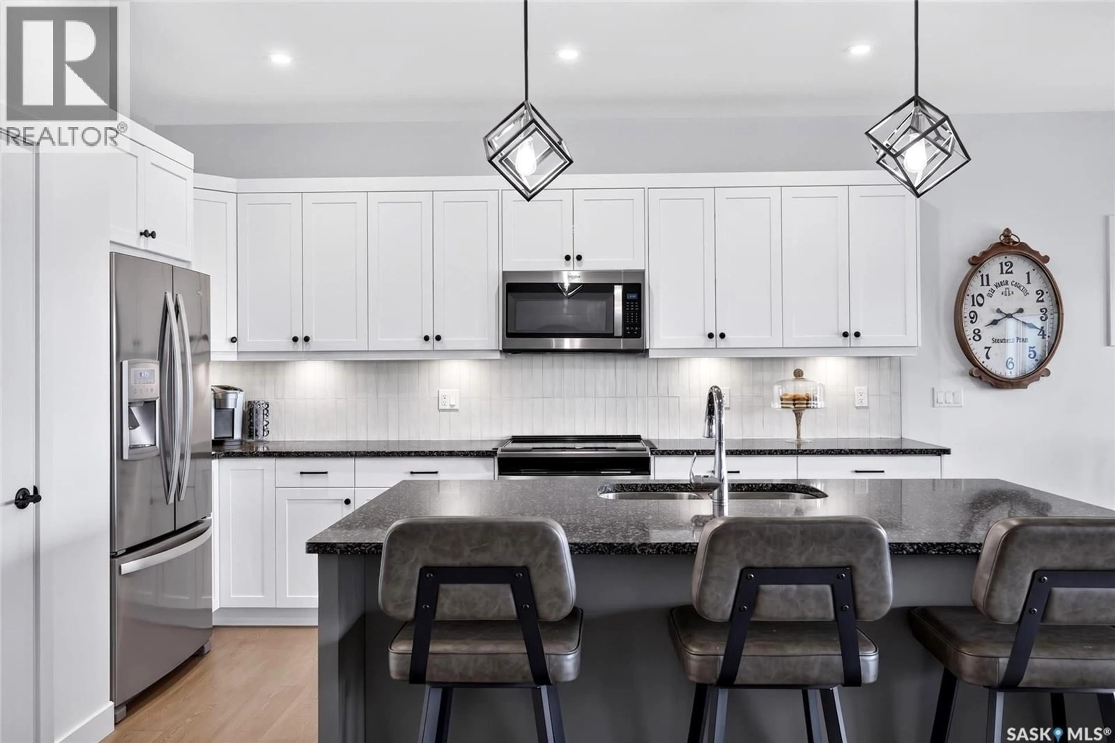 Contemporary kitchen, ceramic/tile floor for 214 SETTLER CRESCENT, Warman Saskatchewan S0K4S5