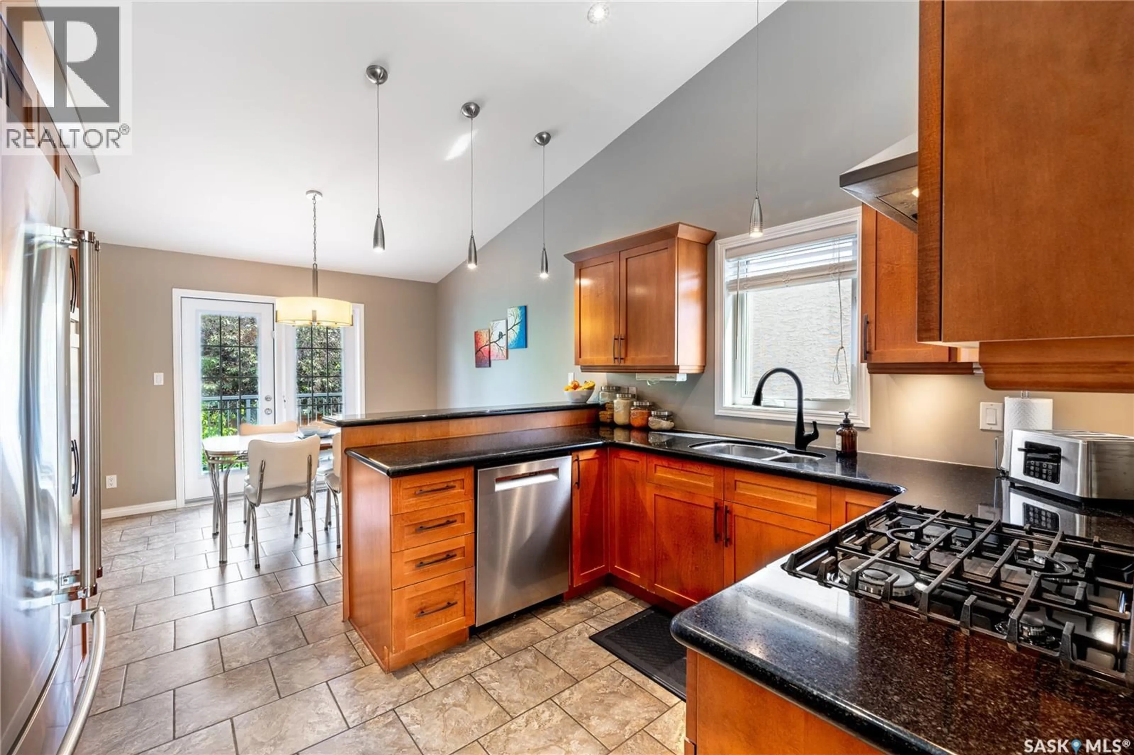 Open concept kitchen, ceramic/tile floor for 1626 BRIARWOOD ROAD, Saskatoon Saskatchewan S7V1H2