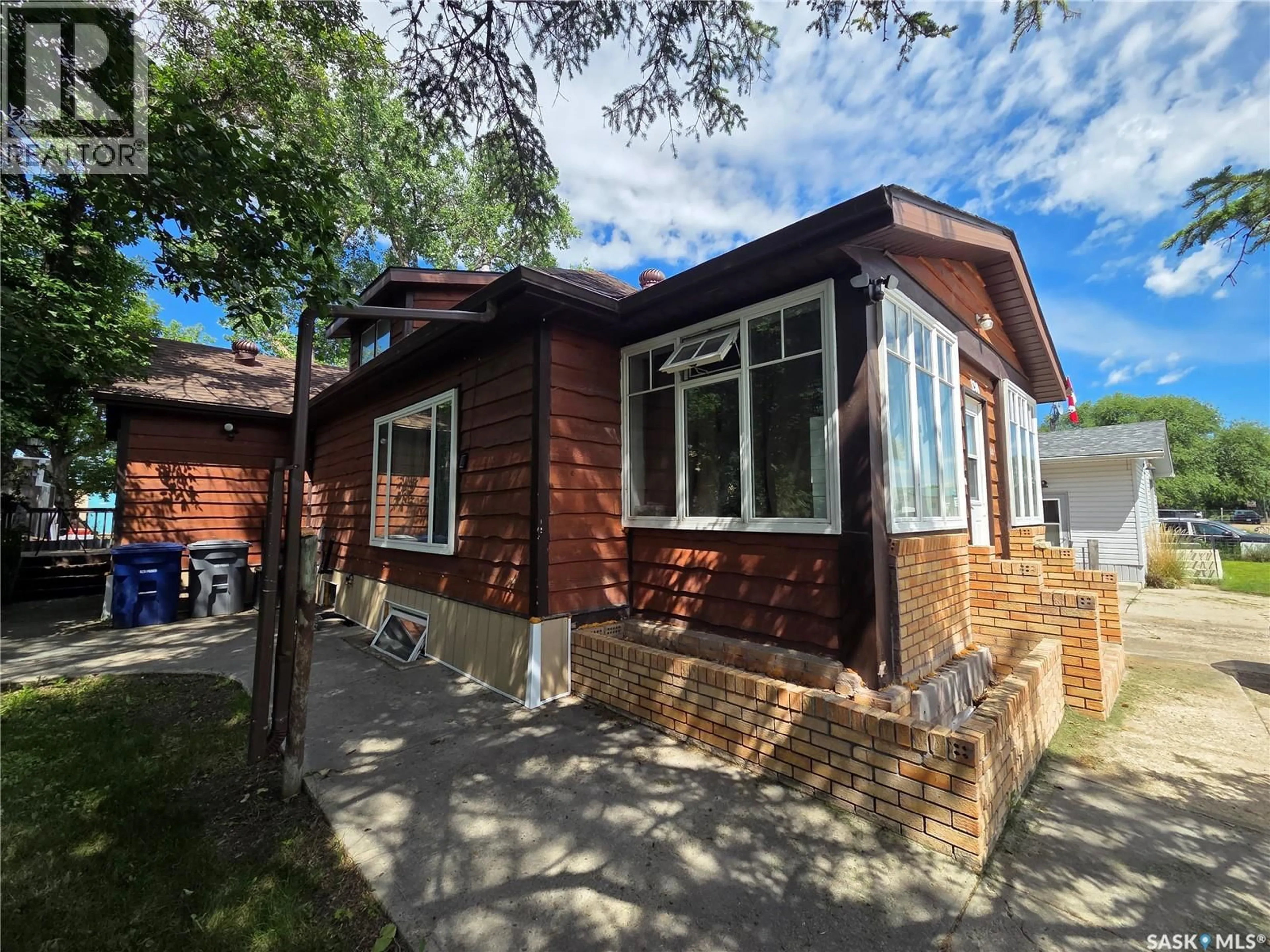 Home with brick exterior material, street for 130 MAPLE AVENUE, Eastend Saskatchewan S0N0T0