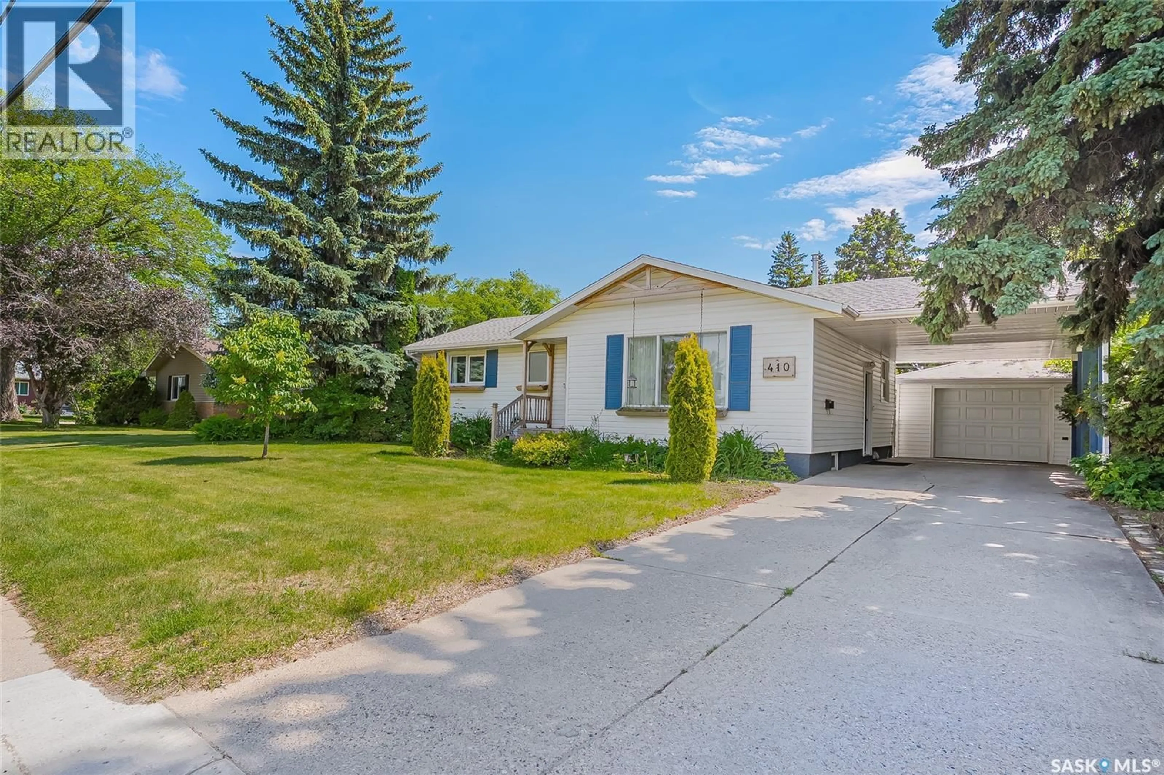Home with vinyl exterior material, street for 410 RUTH STREET, Saskatoon Saskatchewan S7J0L4